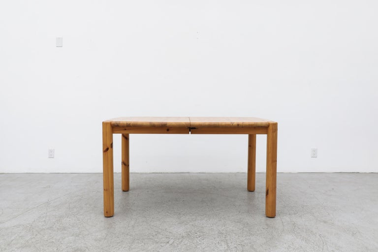Beautiful pine dining table with a leaf by Rainer Daumiller for Hirtshals Savvaerk, Denmark. In original condition with a few light signs of wear, consistent with its age and use. It measures 75.12