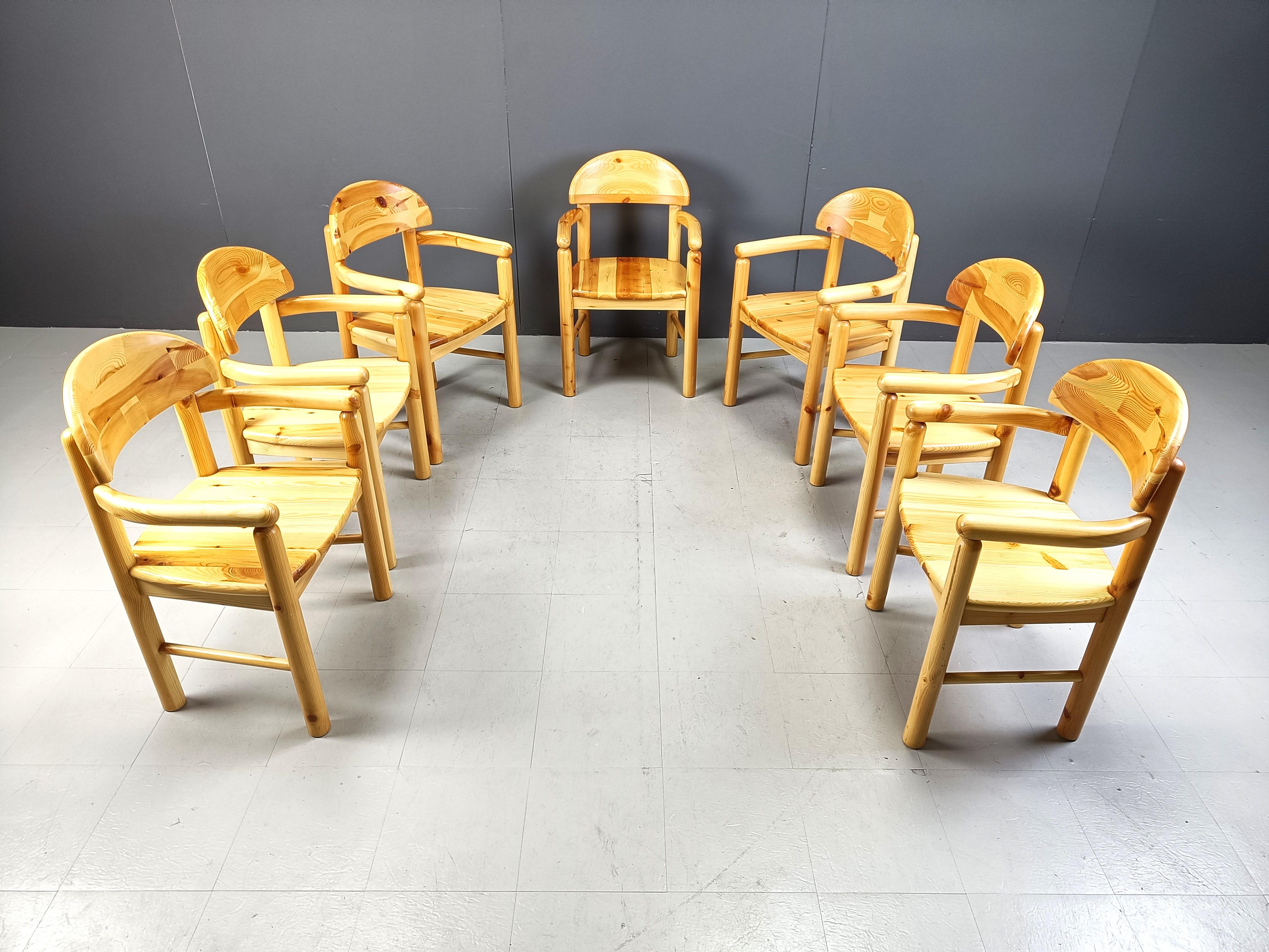 Set of 7 scandinavian solid pine wood dining chairs by Rainer Daumiller for  Hirtshals Savvaerk

The chairs are in good condition.

Nicely shaped armrests and seats.

Beautiful timeless design.

Good original condition with normal age related