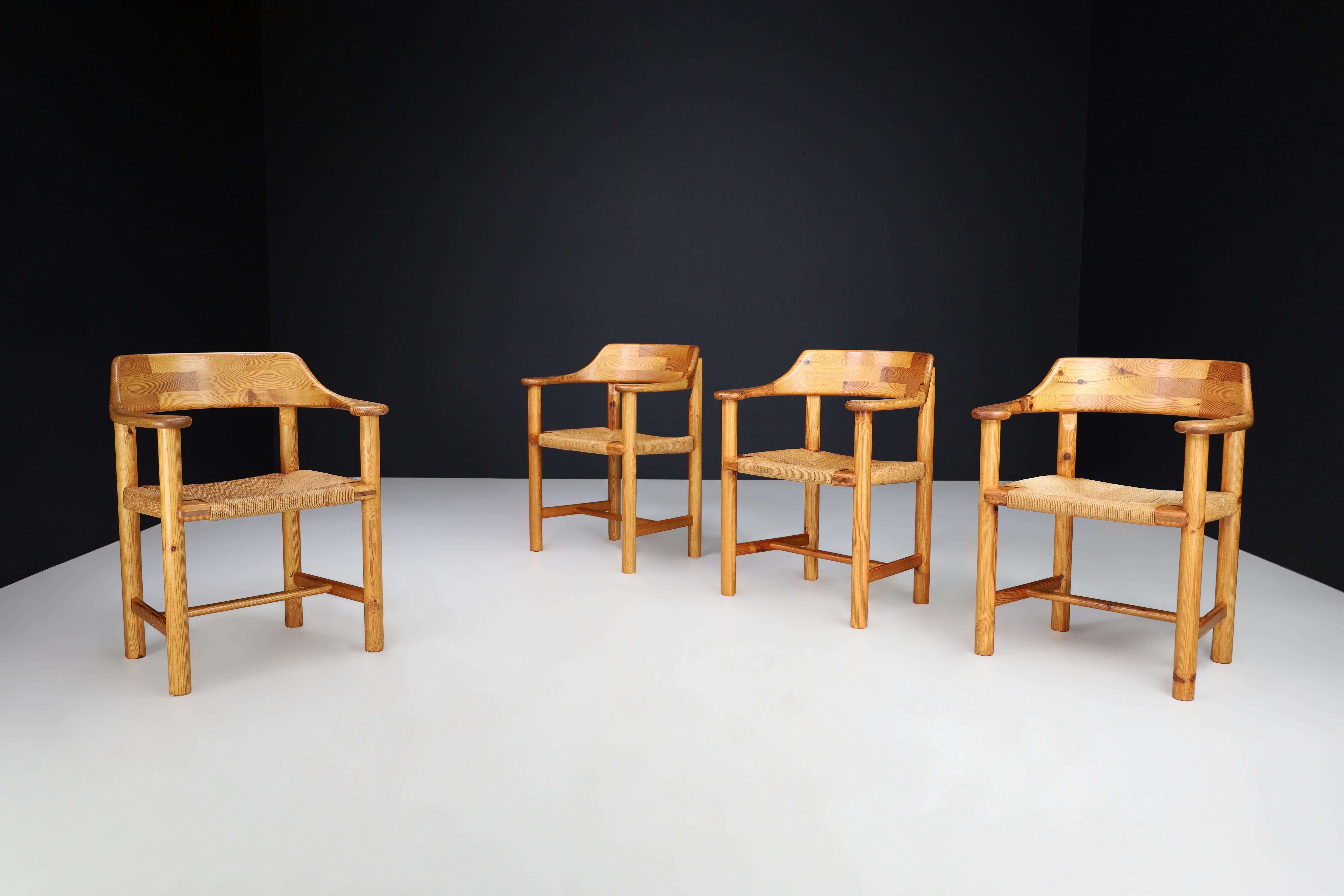 Rainer Daumiller Set of Four Dining Chairs in Solid Pine and Cord Seating, Sweden 1970s

These four modern Scandinavian dining chairs are reminiscent of the work of Danish designer Rainer Daumiller. They are a rare find, crafted from solid pine and