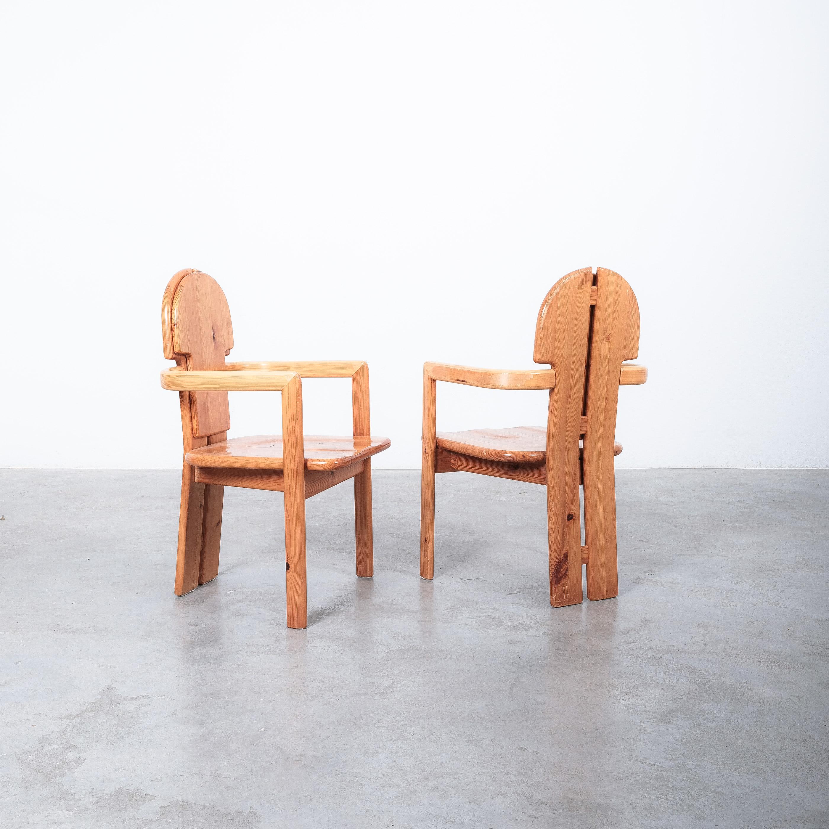 Pair of pine wood armchairs by the Danish architect Rainer Daumiller, produced by Hirtshals Sawmill during the 1970s.

Sold as a set of 2 pieces, we have another set of six Daumiller chairs available that can be combined with these (see