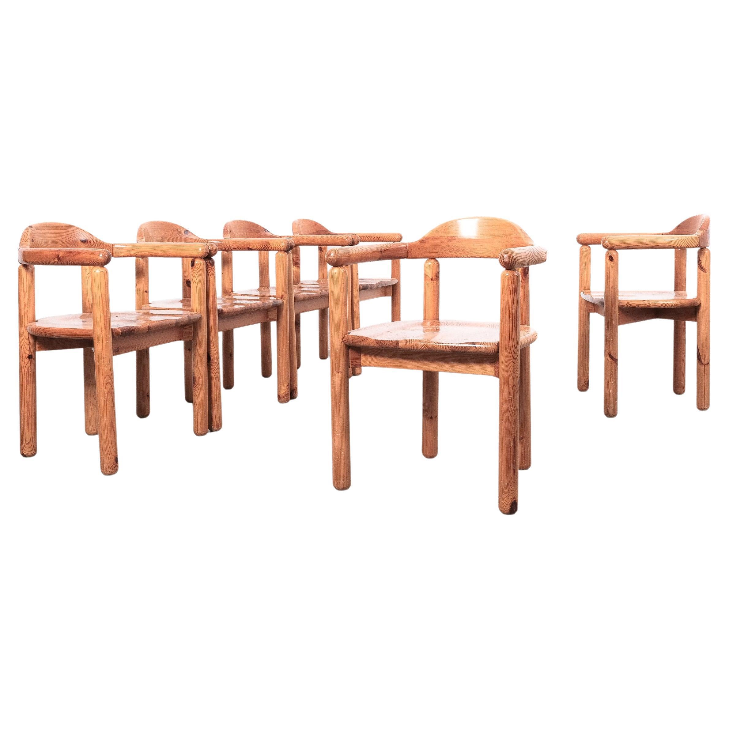 Set of six pine wood armchairs by the Danish architect Rainer Daumiller, produced by Hirtshals Sawmill during the 1970s.

Sold as a set of 6 pieces, we have another pair available that was originally used as head-chairs around the table (see