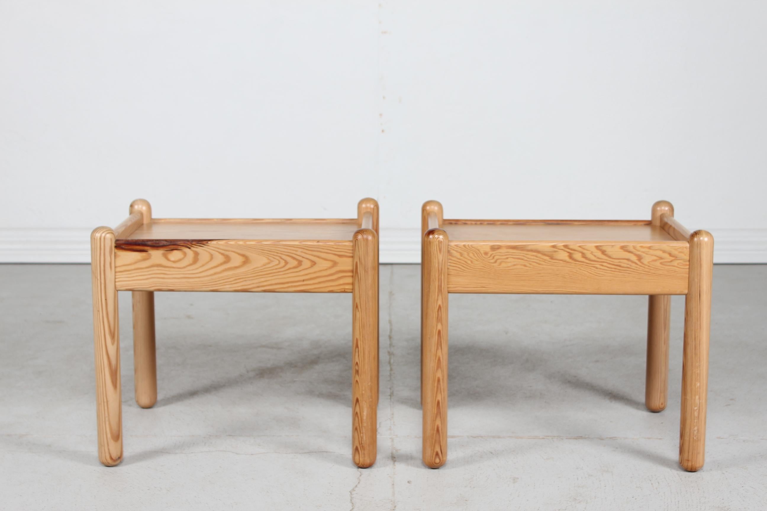 A pair of Rainer Daumiller style brutalist side tables made of solid pine with lacquer.
The small tables are most likely manufactured by Hirtshals Savværk
 in the 1970s.

Very nice vintage condition with great patina.
 