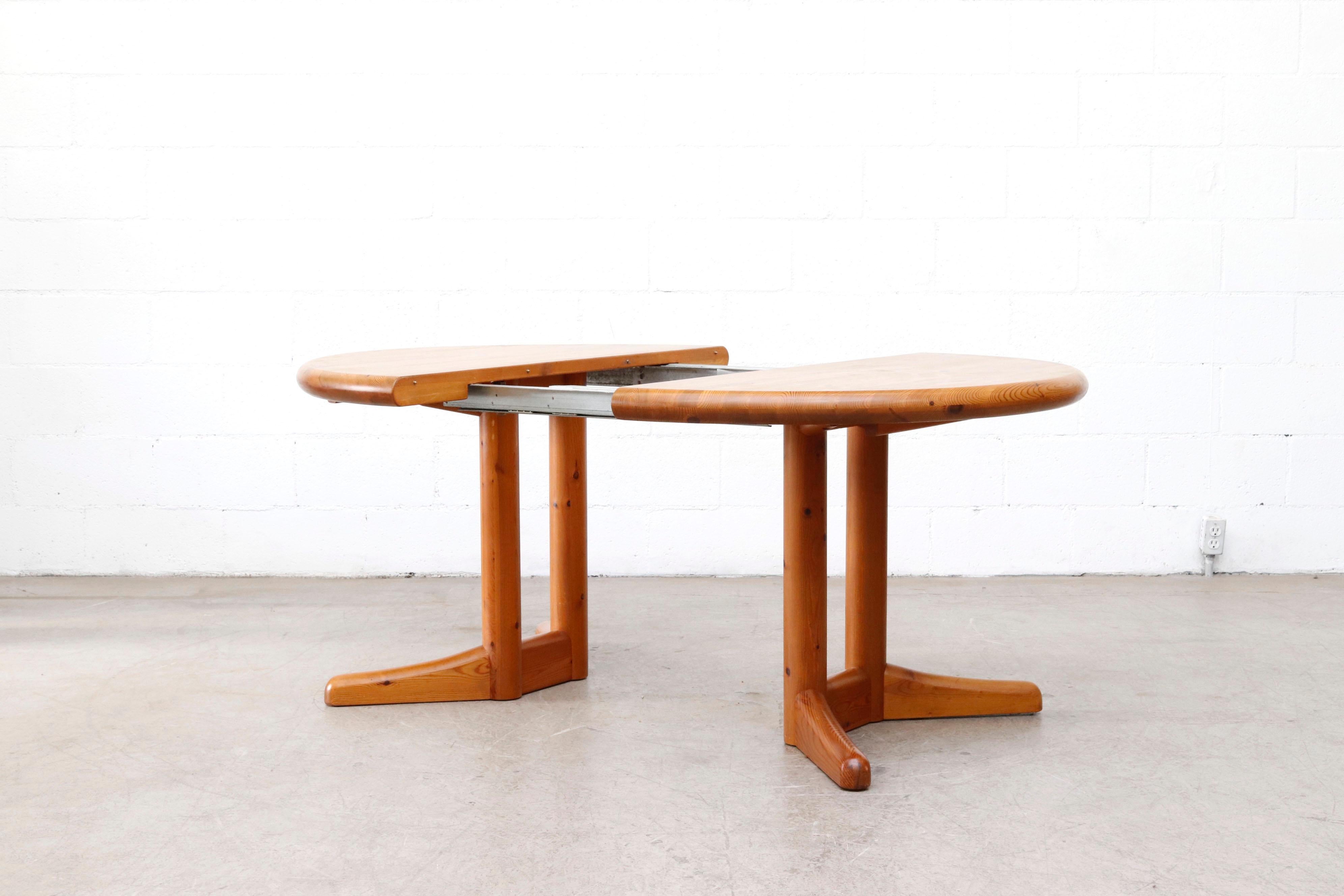 Mid-20th Century Rainer Daumiller Style Round-to-Oval Pine Dining Table with Leaf