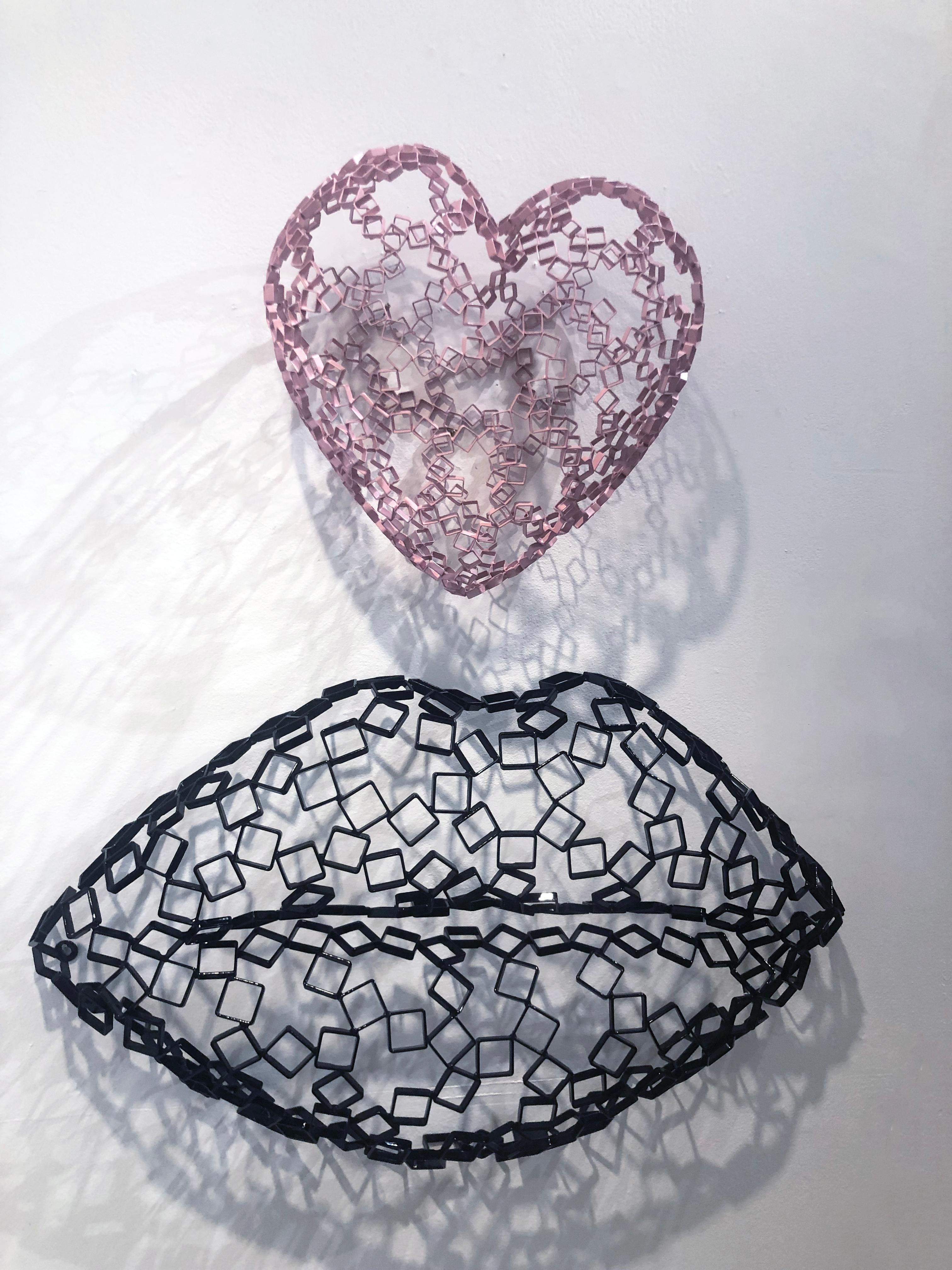 Artist:  Lagemann, Rainer
Title:  H2H (wall mounted)
Series:  Hearts
Date:  2017
Medium:  Stainless steel with light pink powder coat
Unframed Dimensions:  11.5