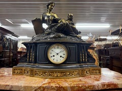 Raingo Freres Bronze and Slate French Louis XV Style Figural Mantel Clock