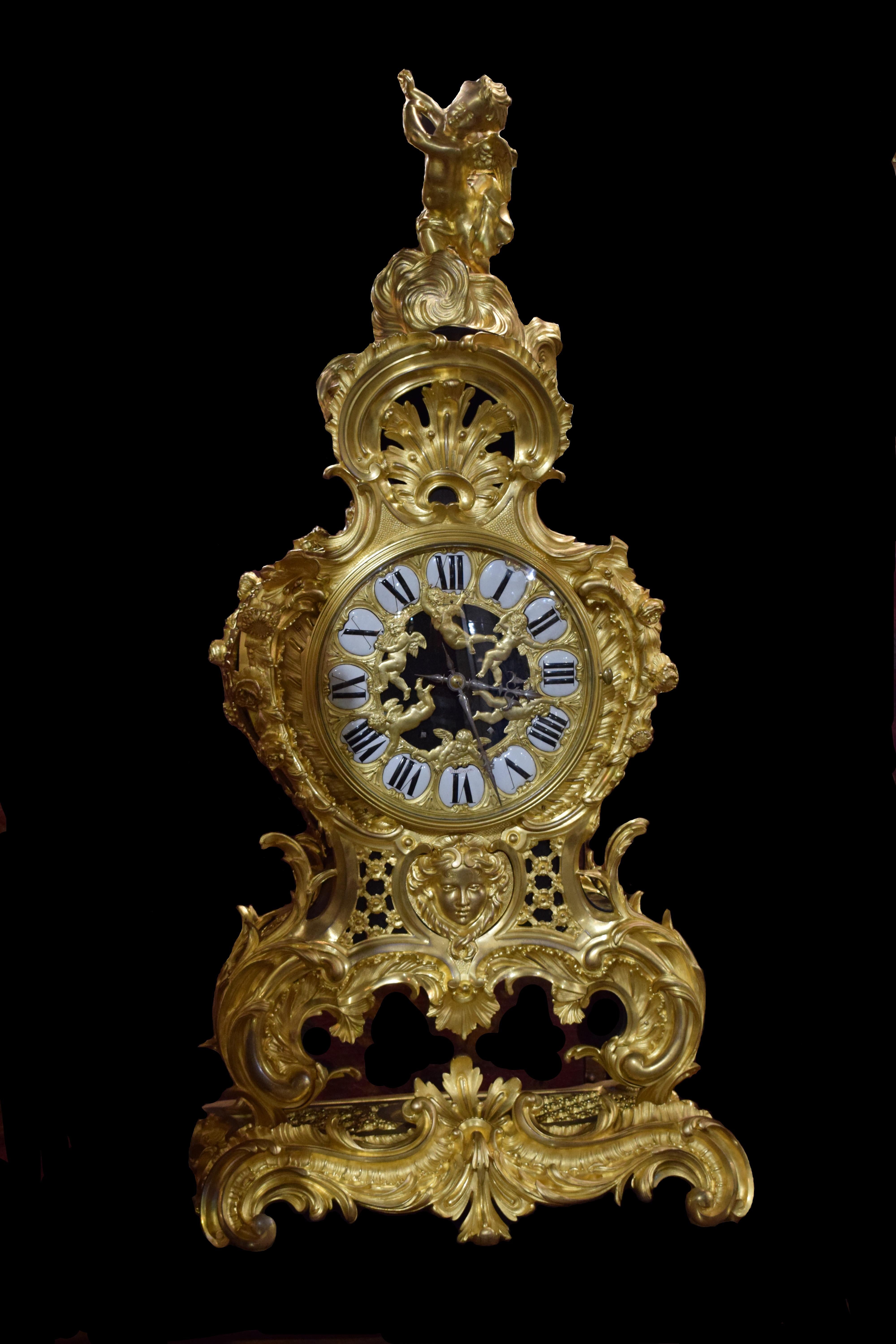 A magnificent ebonized wood and gilt bronze mid-19th century clock signed Raingo Freres, France, circa 1850.

The origins of the company Raingo Frères lie with Zacharie Joseph Raingo (1775-1847), a clockmaker, who was born in Belgium in 1775.