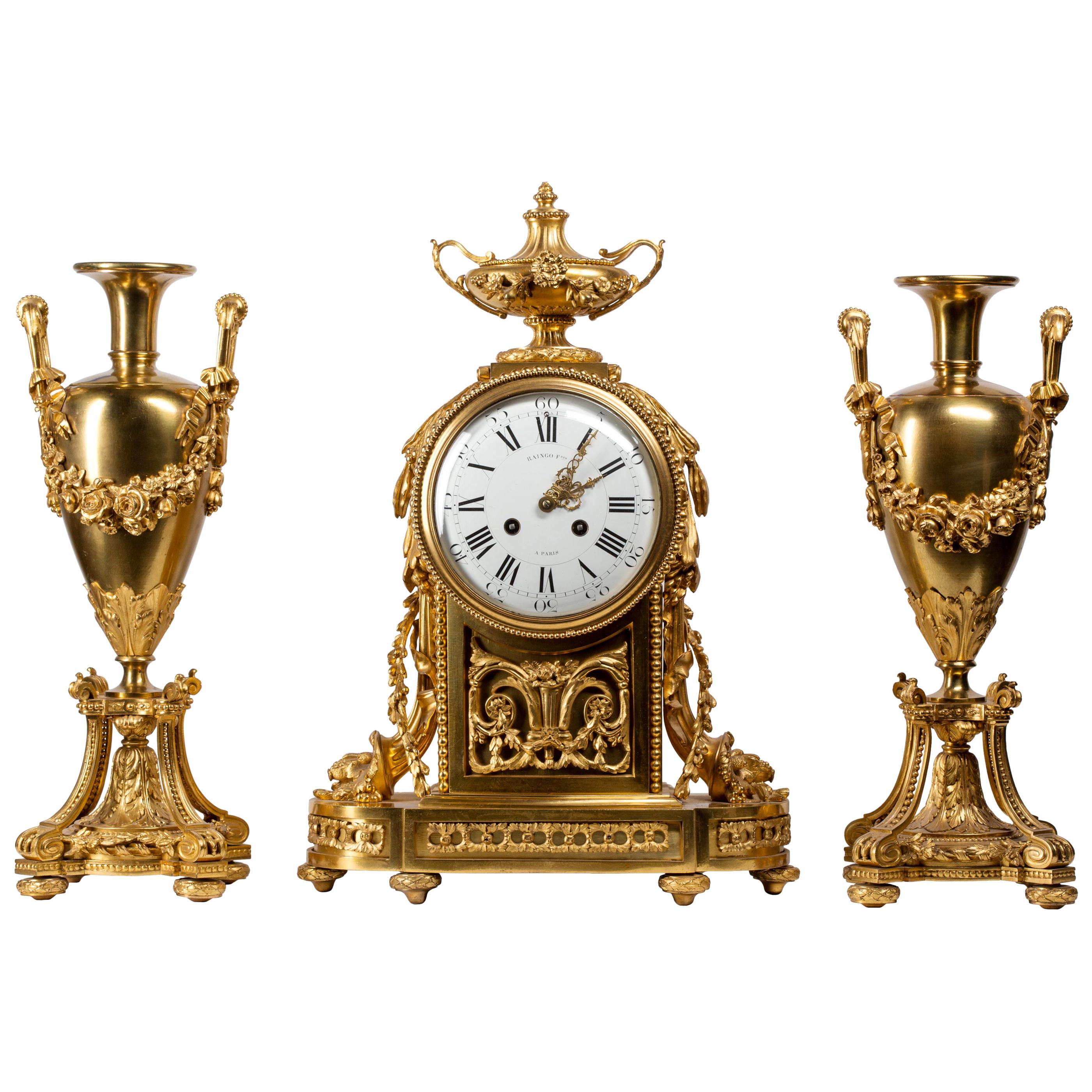 Raingo & Frères Neoclassical Ormolu Clock, Three-Piece Set with Vase Garniture