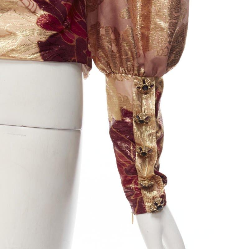 RAISA VANESSA rose gold foil jacquard rhinestone buttons Victorian top FR34 XS
Reference: AAWC/A00413
Brand: Raisa Vanessa
Material: Polyester, Blend
Color: Gold
Pattern: Abstract
Closure: Button
Lining:  Fabric
Extra Details: Crystal embellished