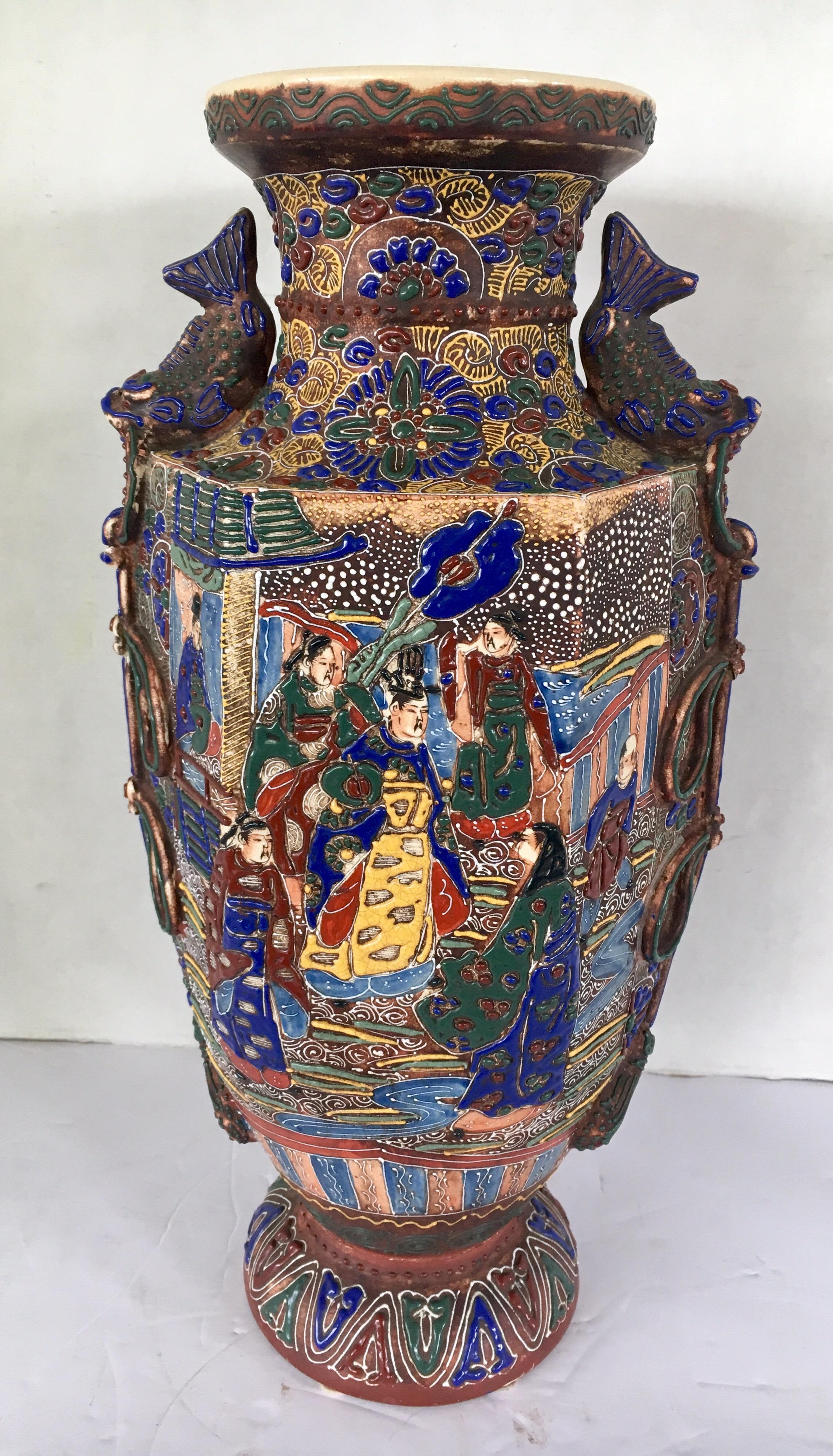 Coveted raised ceramic Satsuma style Japanese Urn. Vivid and vibrant colors throughout.
