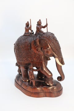 Raj period large Indian carved hardwood study of a ceremonial elephant c 1920