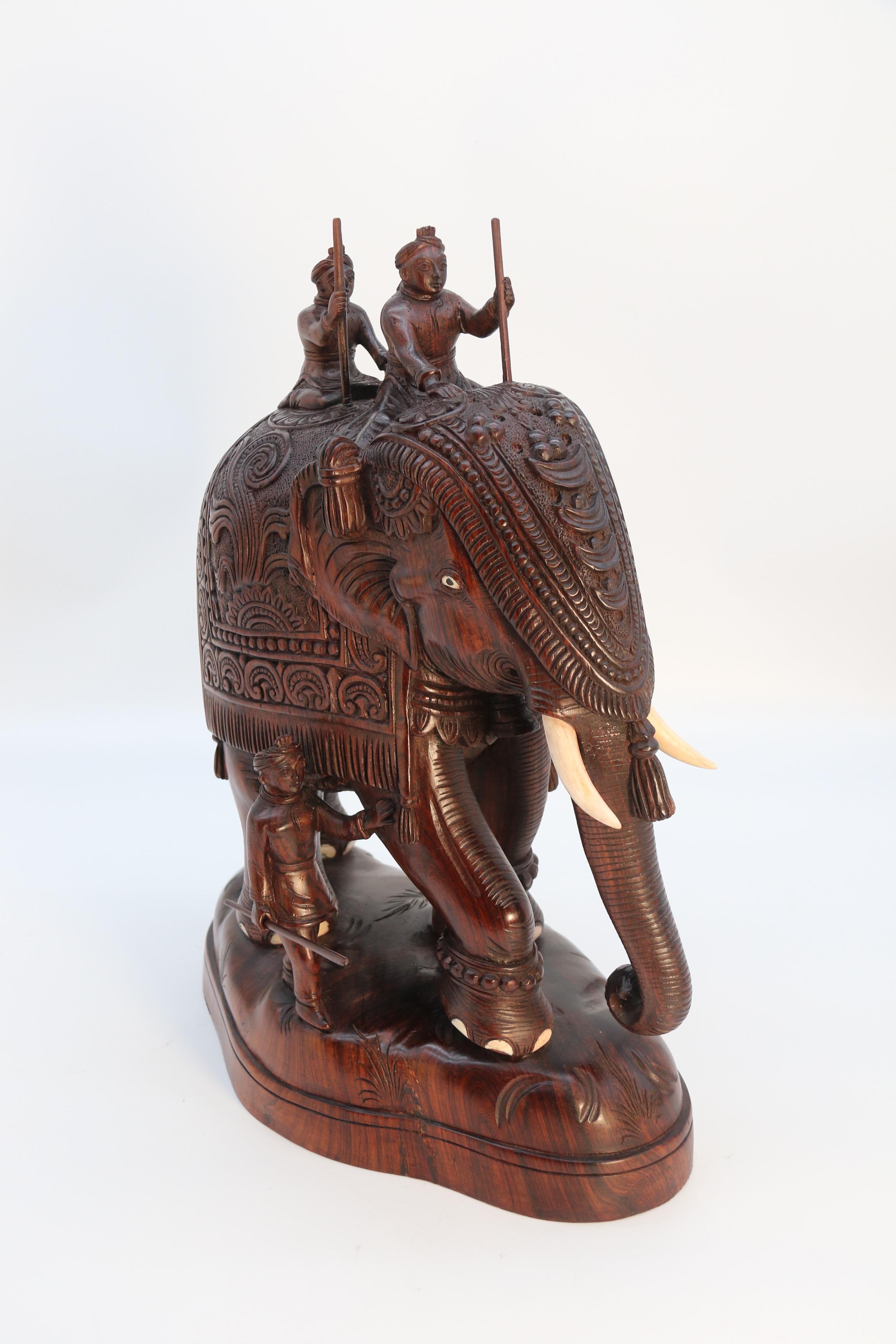 Anglo Raj Raj period large Indian carved hardwood study of a ceremonial elephant c 1920 For Sale