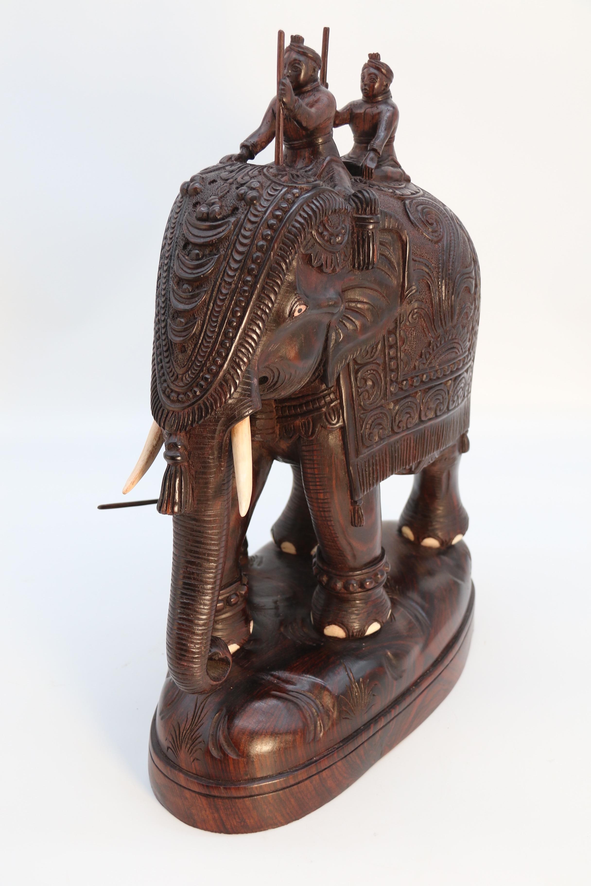 Raj period large Indian carved hardwood study of a ceremonial elephant c 1920 In Good Condition For Sale In Central England, GB