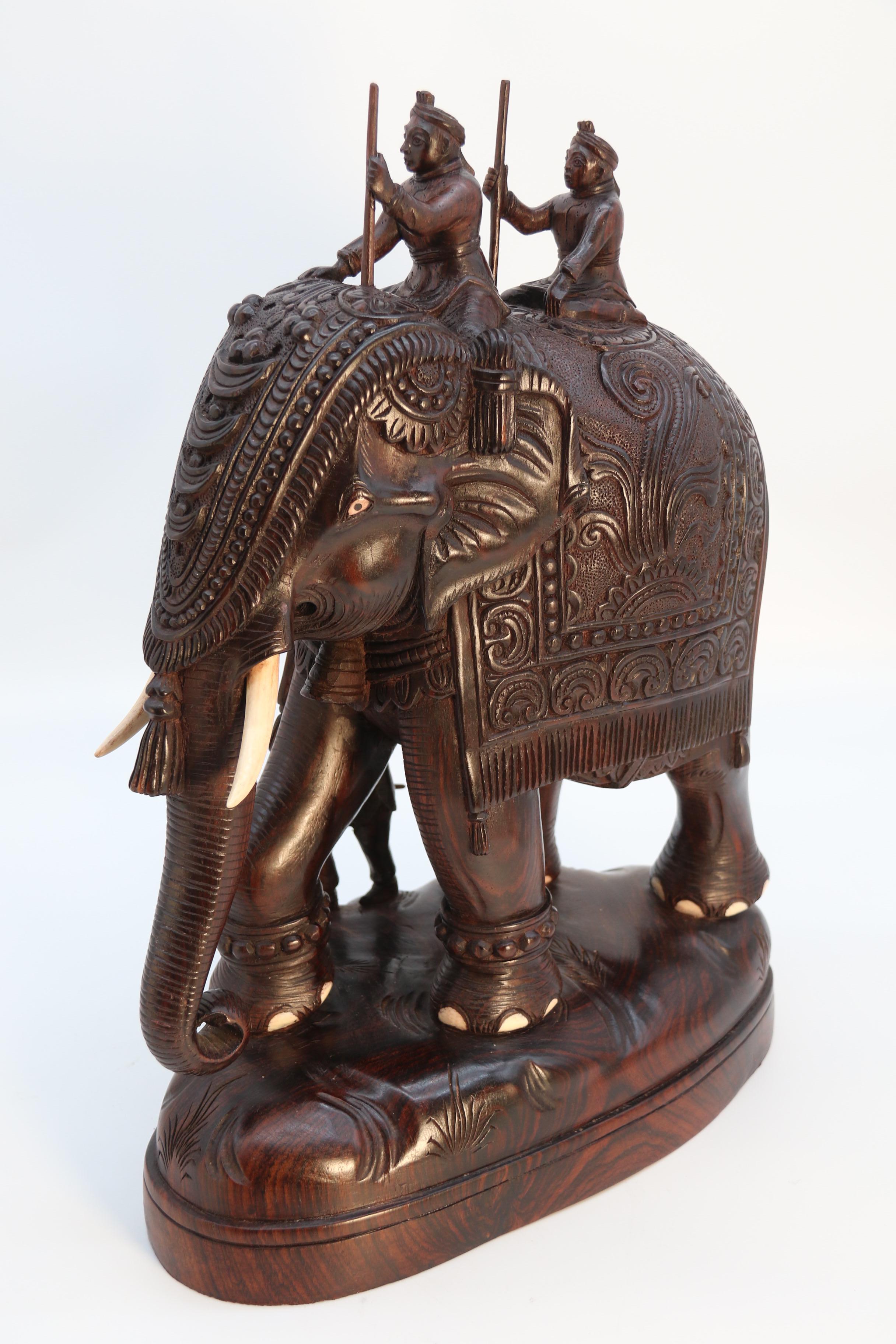 20th Century Raj period large Indian carved hardwood study of a ceremonial elephant c 1920 For Sale