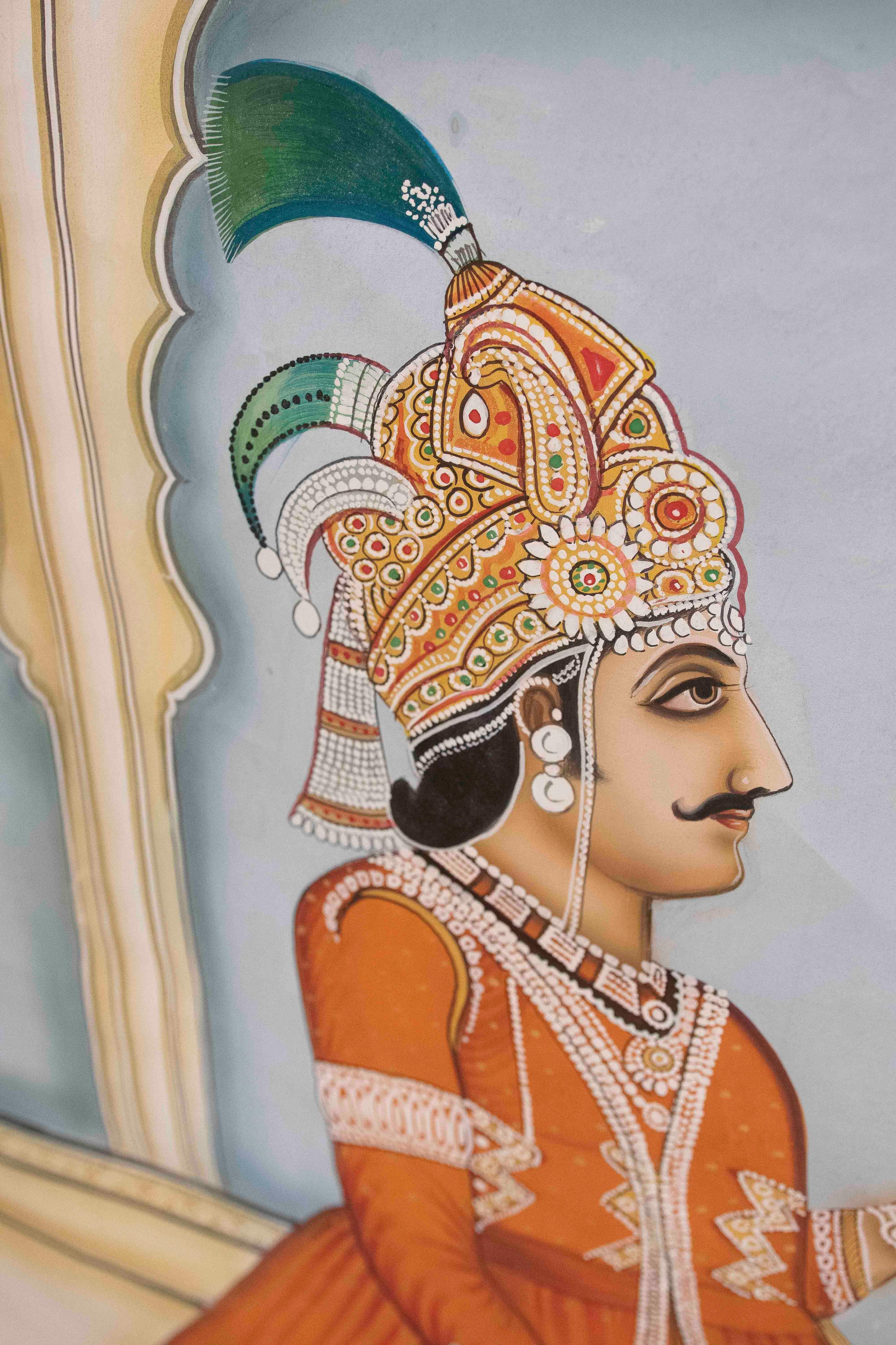 Hand-Painted Rajasthani Indian Painting with Nobleman Holding Lotus Flower and Pearl Necklace For Sale