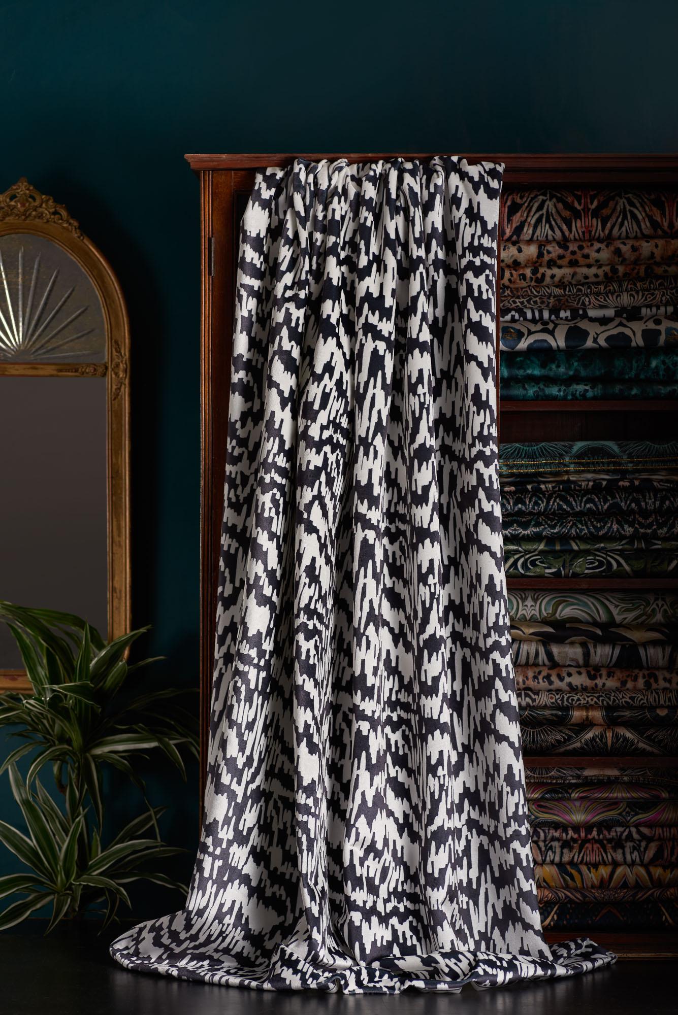 An energetic design by Anna derived from a lino print, in classic black and white.

This velvet is thick and luxurious, with a strong straight woven backing. It is suitable for upholstery, but is also light enough for curtains and cushions.

139cm