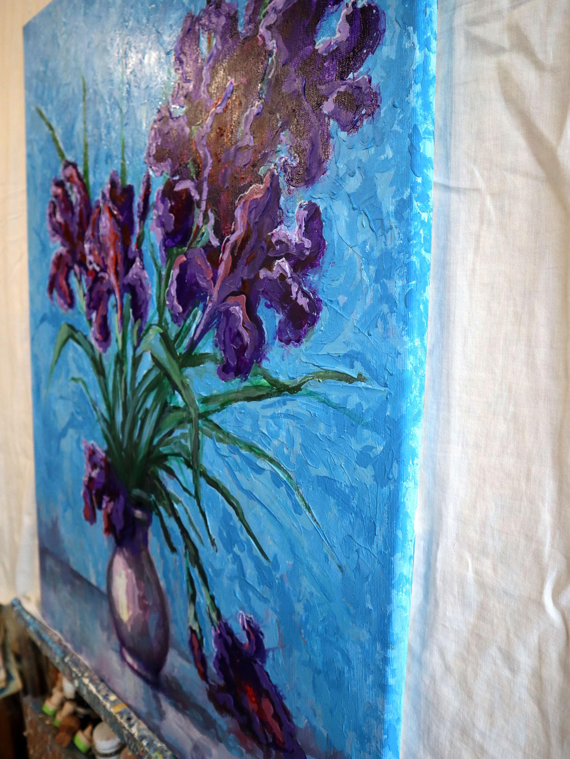 In this painting, I sought to capture the ephemeral beauty of irises, using vibrant strokes of acrylic and oil to express their dynamic, almost lively forms against a vivid blue backdrop. Influenced by abstract, expressionist, and impressionist