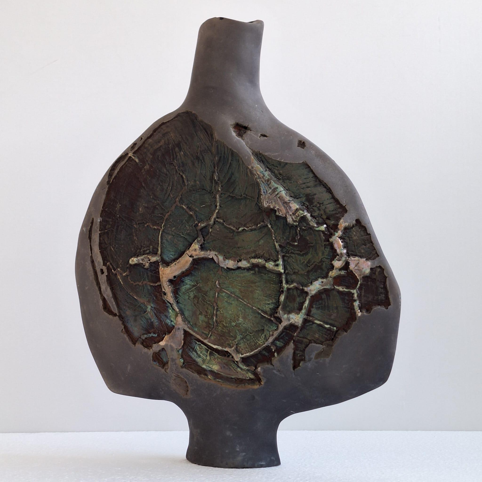 Design vase in raku ceramics designed by André Sas. Raku was developed in the 16th century in Japan by the Raku family. Traditionally, this technique was only used for making tea bowls. After firing, the bowl was simply cooled in the open air,