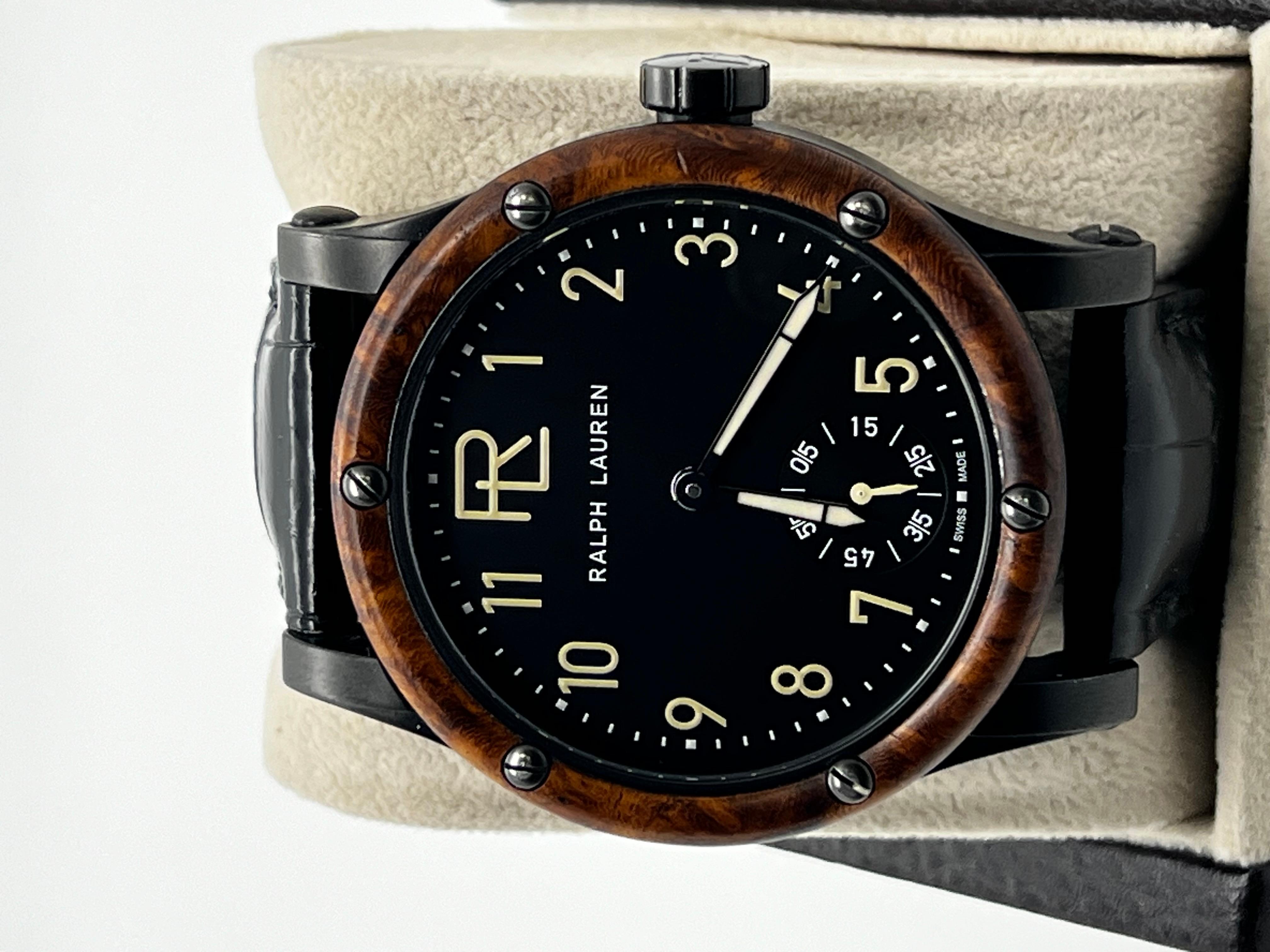 Style Number: 359403

 

Model: Automotive Collection 

 

Case Material: Black Gunmetal Stainless Steel 

 

Band: Leather

 

Bezel: Burl Wood 

 

Dial: Black 

 

Face: Sapphire Crystal 

 

Case Size: 39mm 

 

Includes: 

-Elegant Watch