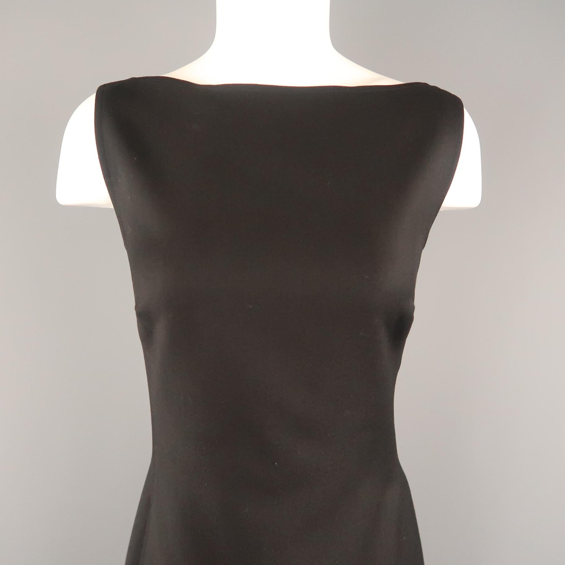 RALPH LAUREN BLACK LABEL sleeveless shift dress comes in black wool twill with a boat neck and A line silhouette. Made in USA.
 
Excellent Pre-Owned Condition.
Marked: 8
 
Measurements:
 
Shoulder: 14 in.
Bust: 38 in.
Waist: 32 in.
Hip: 40