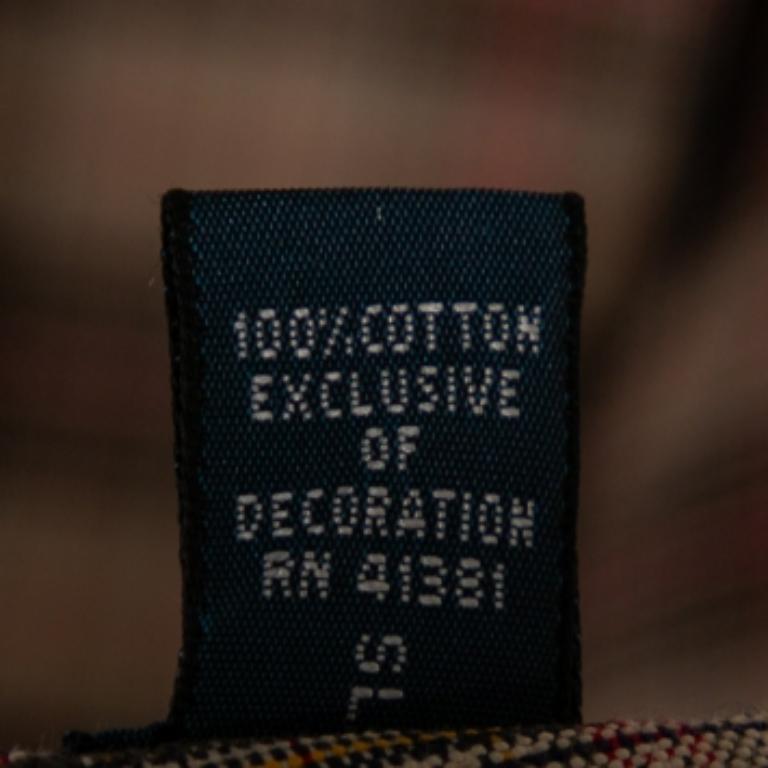 Las camisas Ralph Lauren están diseñadas pensando tanto en la comodidad como en el lujo, para que puedas llevarlas durante mucho tiempo. Esta sencilla creación está confeccionada en algodón y presenta un tono beige. Las mangas largas y el diseño