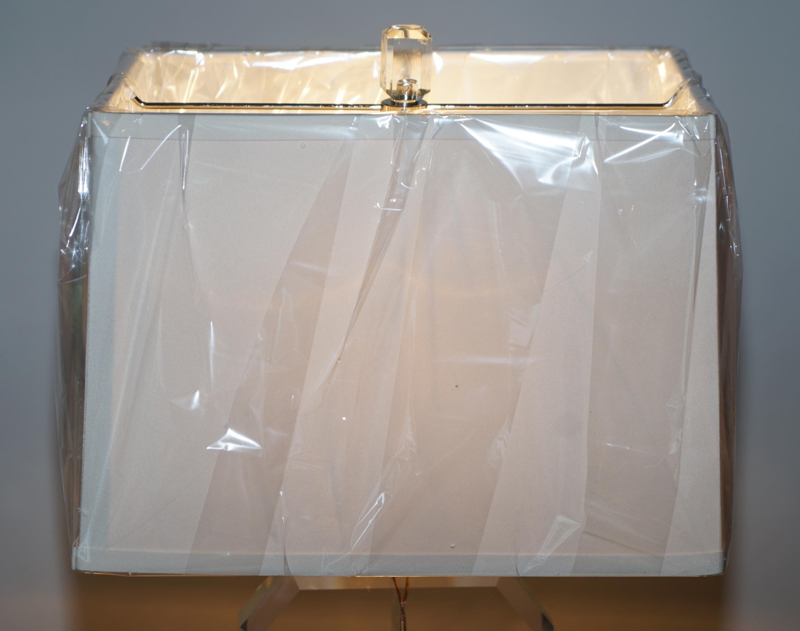 I am delighted to offer for sale this brand new in the original box Ralph Lauren bevelled Perspex table lamp

I have a number of brand new Ralph Lauren rugs and lamps in stock plus various Tommy Hilfiger bedding sets, please view my other items,