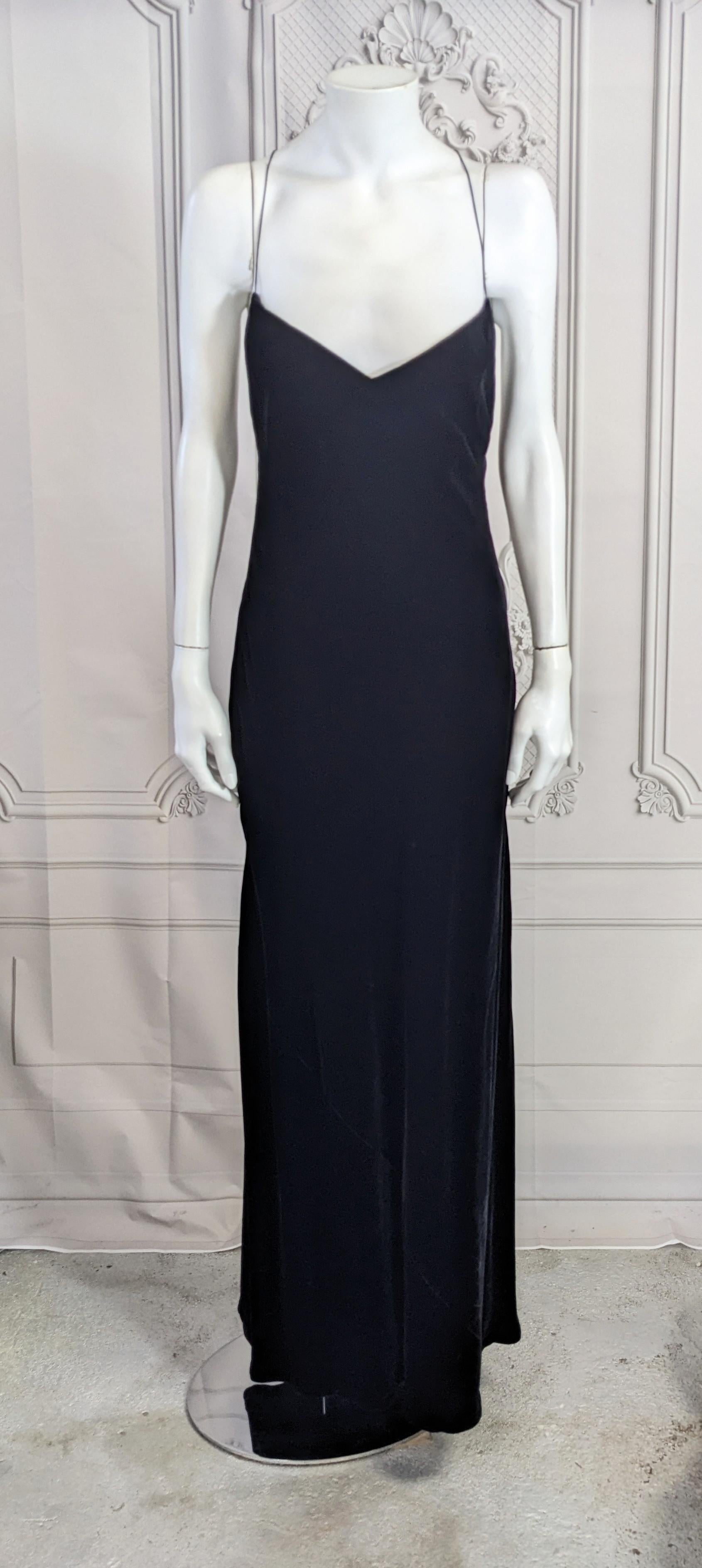 Classically elegant Ralph Lauren Bias Silk Velvet Slip Dress from the late 1990s. Bias cut in the typical 1930's style with silk cord straps. Luxurious inky black silk velvet completely lined in silk satin. Beautifully and simply cut for a sexy,