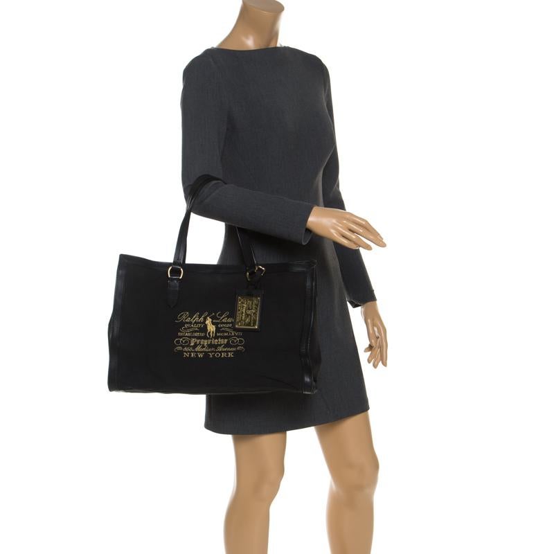 Sure to be the showstopper, this tote from Ralph Lauren incorporates a touch of class. Crafted from black canvas and styled with leather trims, this tote comes with a fabric lined interior to store your favourite accessories.

Includes: The Luxury