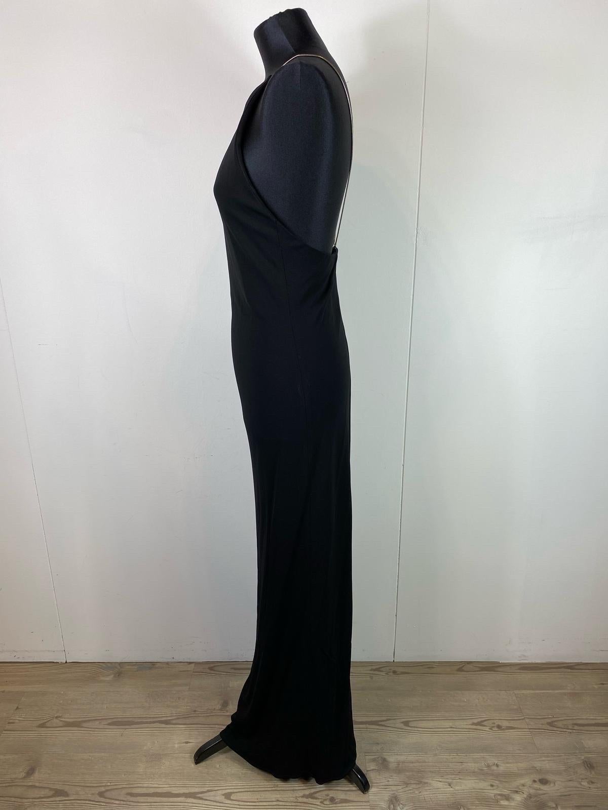 Ralph Lauren black viscose dress by Ralph Lauren, with smooth chain straps, neckline on the back, closure in the center back with invisible zip.
Slightly stretchy
In perfect condition
Size 8
Bust 40 cm
Waist 38 cm
Total length 150 cm
Straps Length