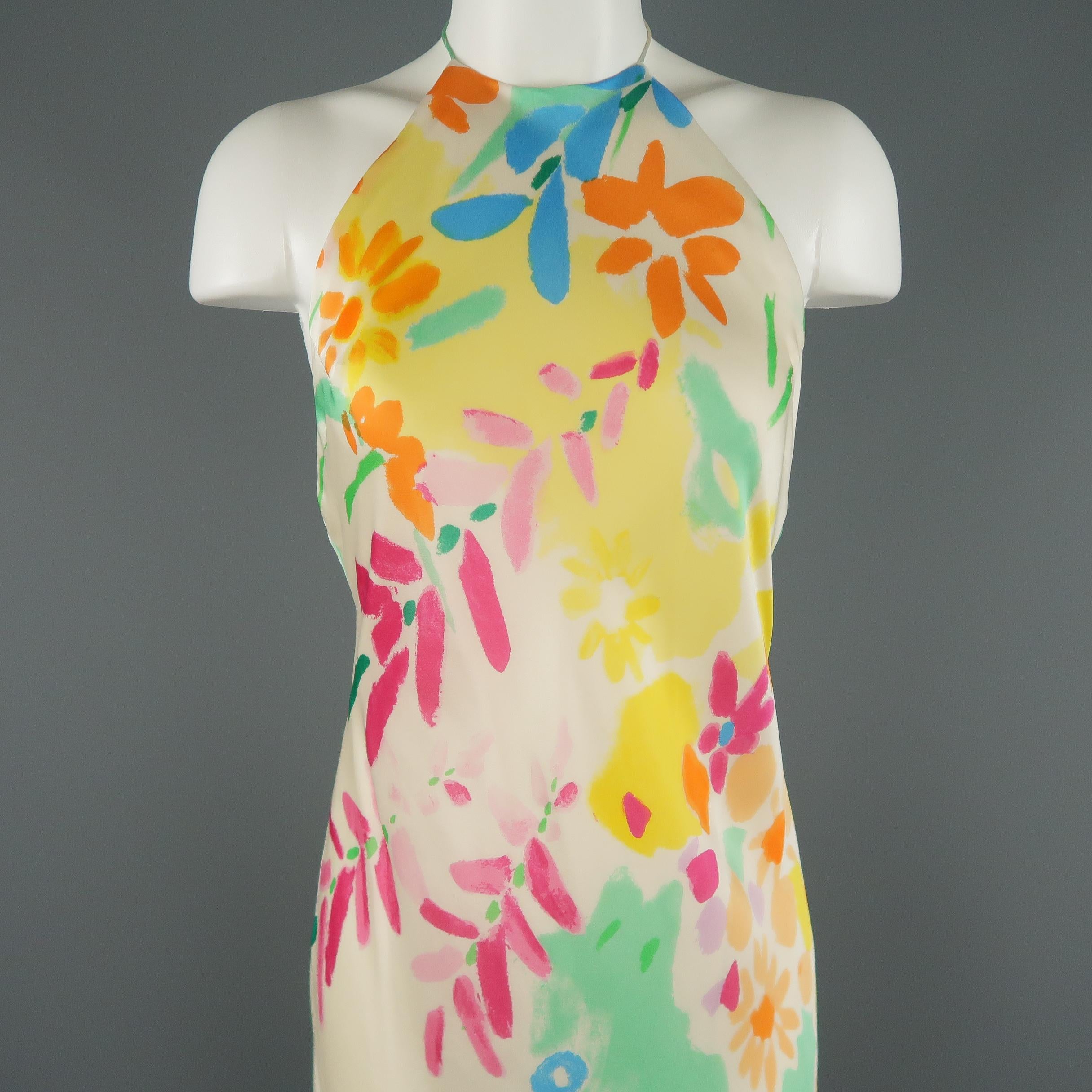 RALPH LAUREN BLACK LABEL gown comes in cream silk with all over multi-color watercolor floral print, fitted silhouette with a subtle drape, low cut back, and sleeveless tied halter neckline. Made in USA.
 
Very Good Pre-Owned Condition.
Marked: 6
