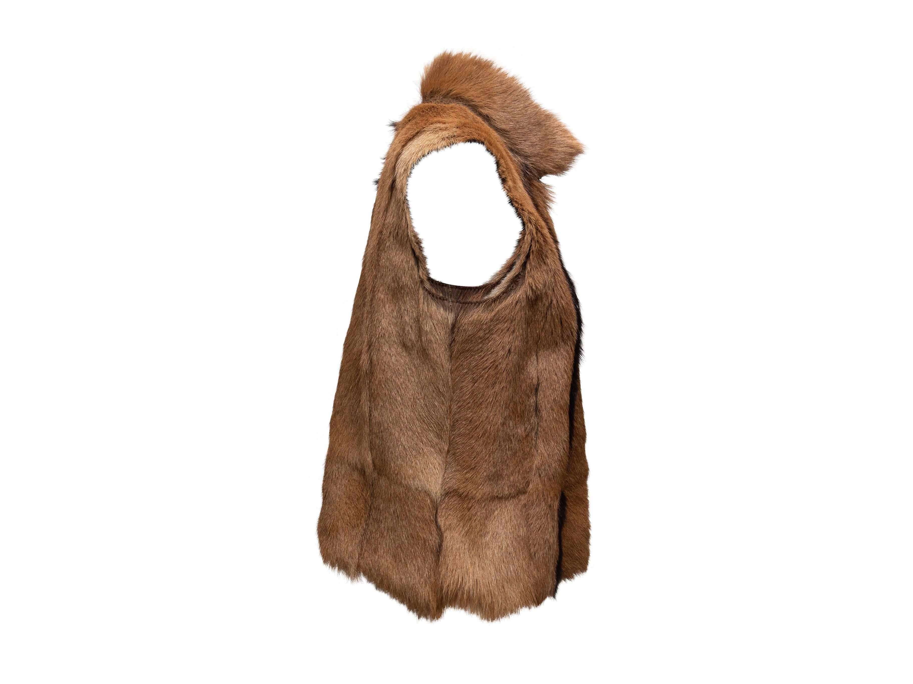 Product details: Brown goat fur vest by Ralph Lauren Black Label. Stand collar. 38