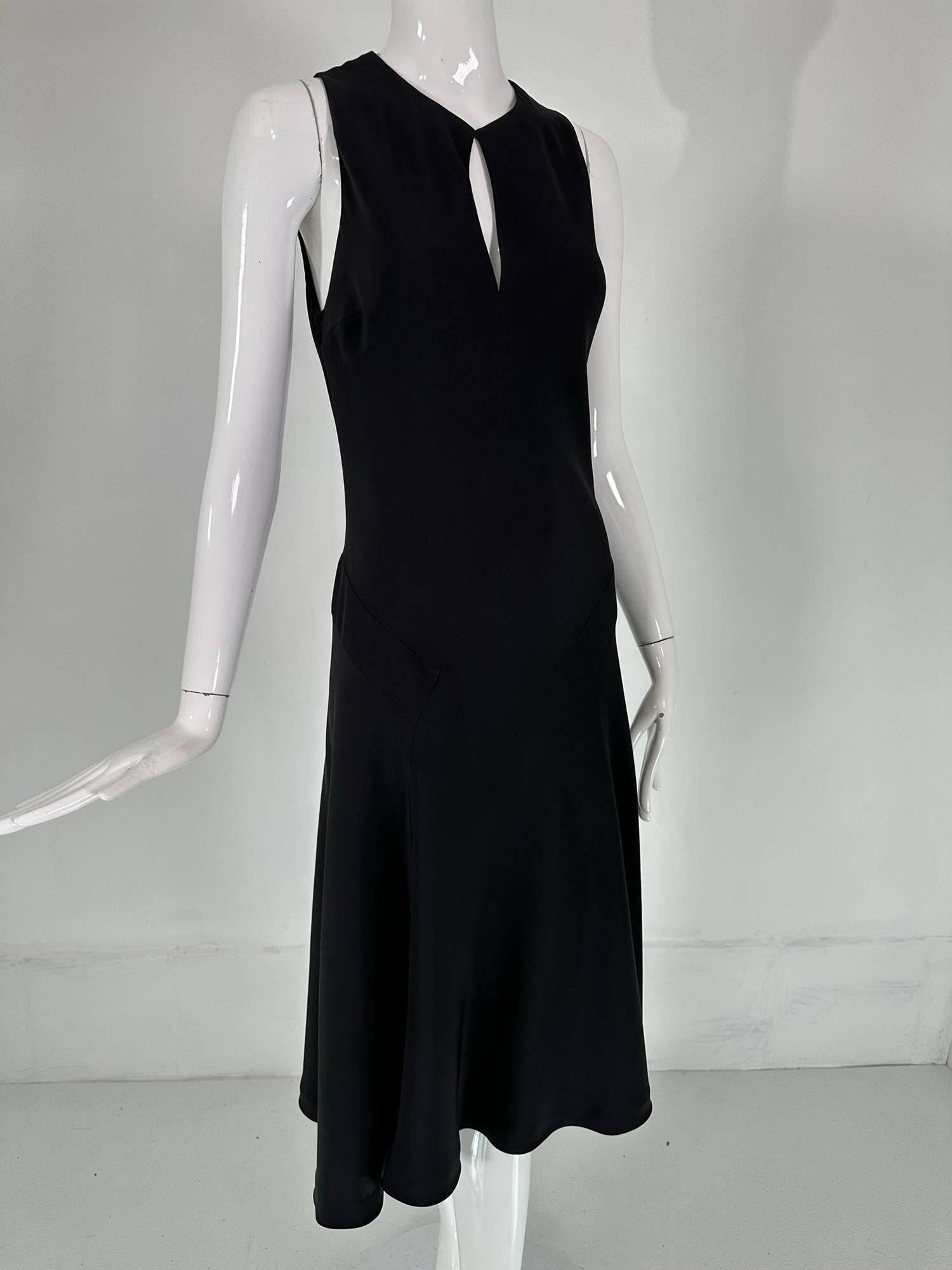 Ralph Lauren Black Label classic silk bias cut dress marked size 8. No one interprets the classic style like Ralph Lauren & this little black dress is an example of his best. A bit of the early 1930s with its intricate bias piecing the allows the