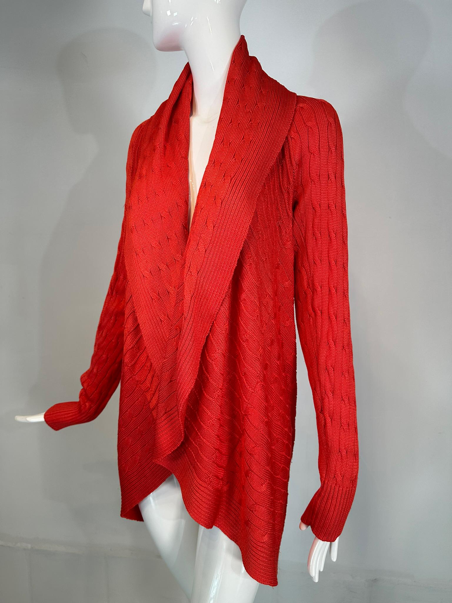 Ralph Lauren Black Label coral 100% silk cable knit circle, open front sweater marked size large. Long sleeve sweater with a deep wrap collar, wear it open or wrapped with a belt. In very good pre-owned condition. 
In excellent wearable condition. 