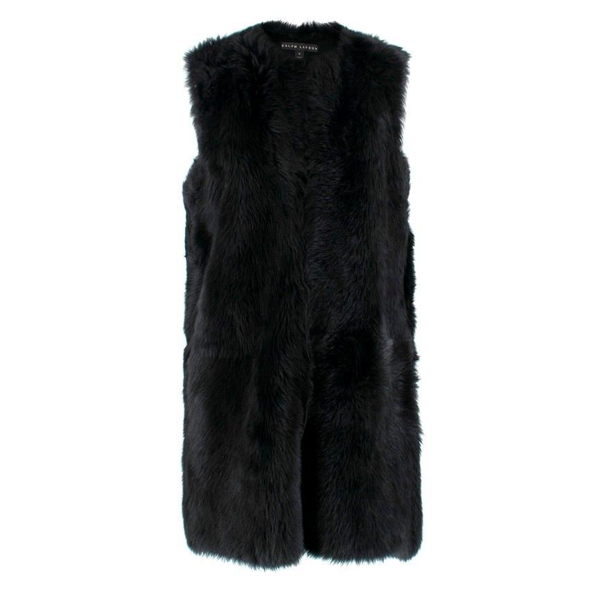 Ralph Lauren Black Shearling Gilet

-Black label Ralph Lauren
-Black shearling gilet with hook and eye closure
-Two side pockets
-Scoop neckline

Please note, these items are pre-owned and may show signs of being stored even when unworn and unused.