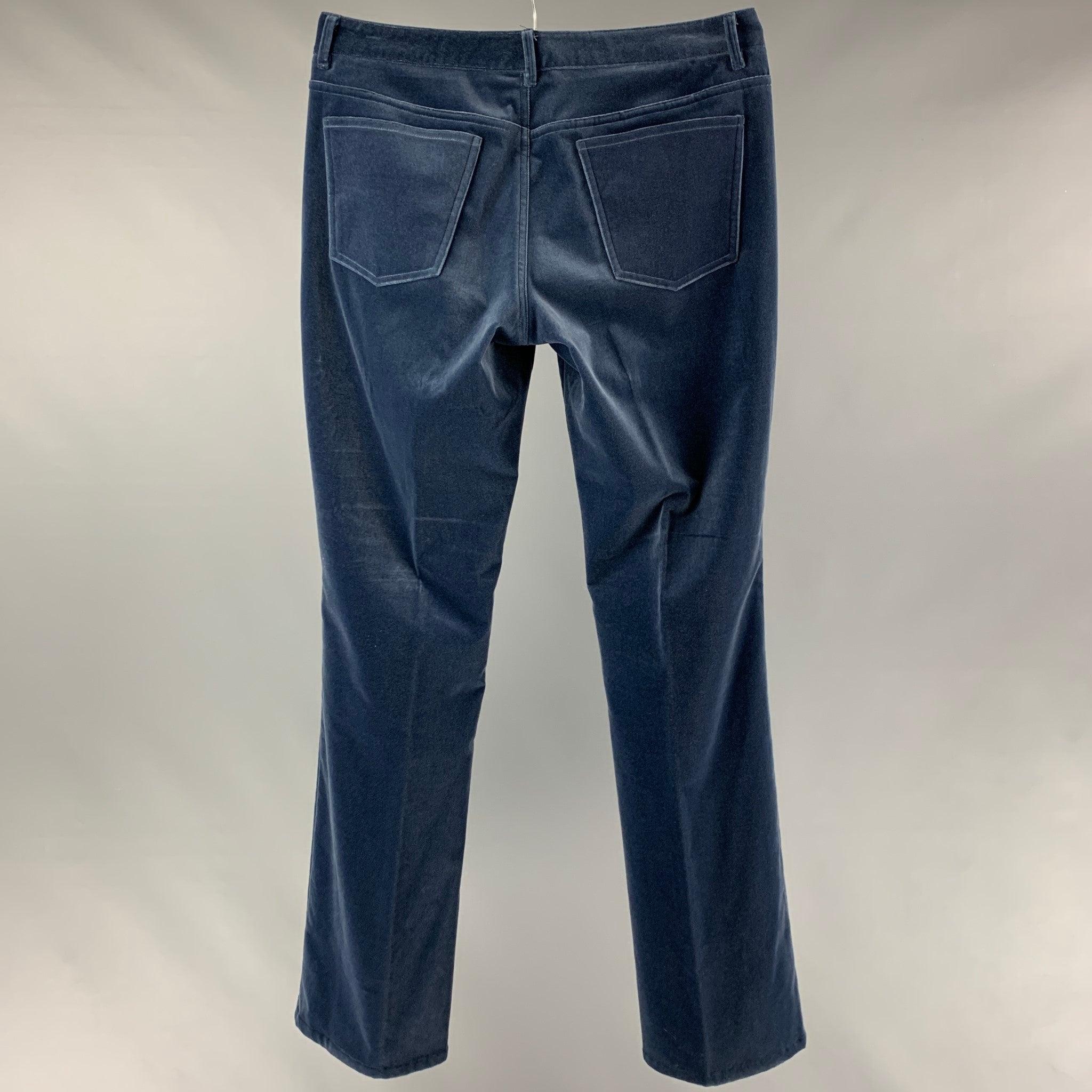 RALPH LAUREN BLACK LABEL dress pants comes in blue cotton and elastane velvet fabric, five pockets , a straight legs, zip up fly closure.Very Good Pre-Owned Condition. Minor Mark at Front. 

Marked:   10 

Measurements: 
  Waist: 34 inches  Rise: