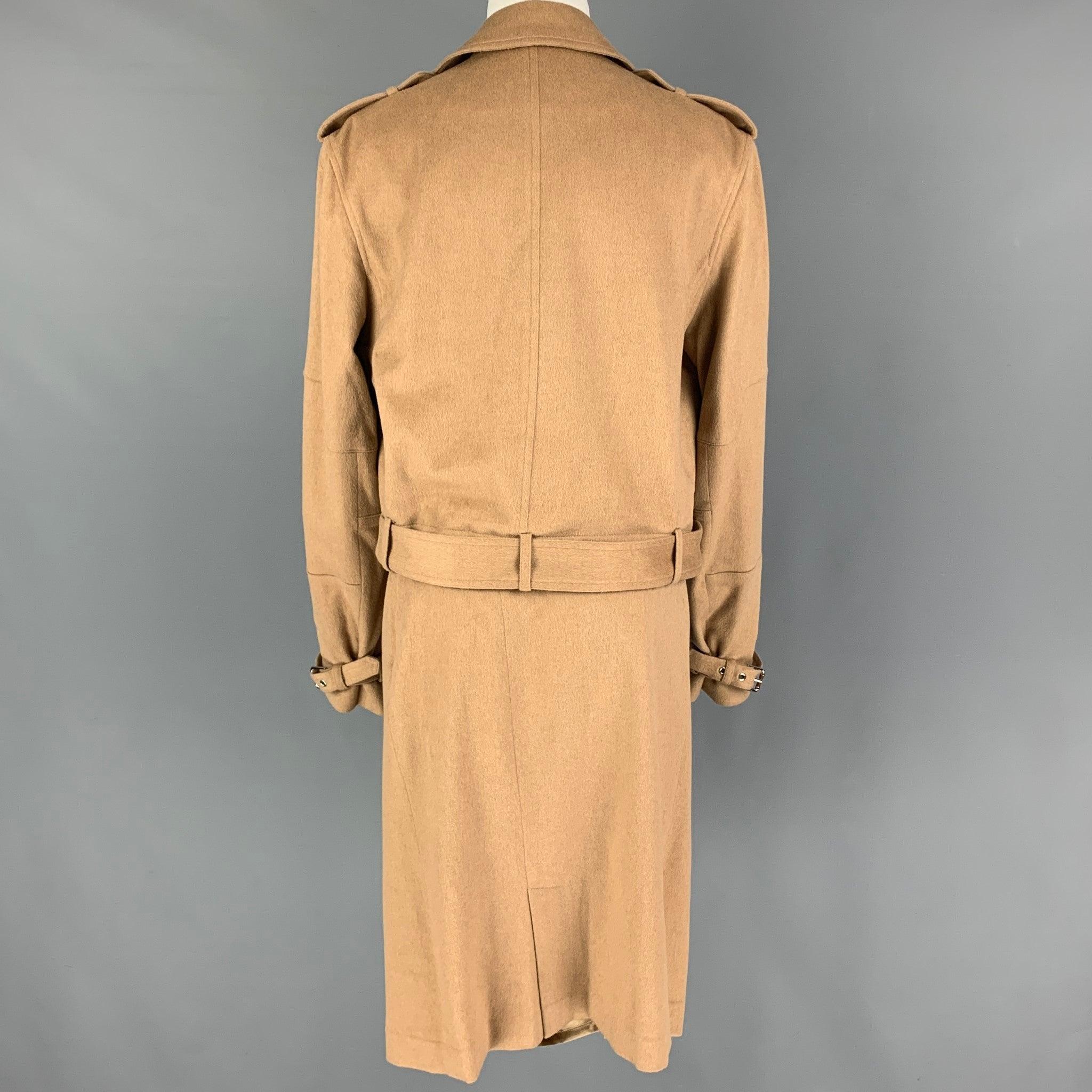 RALPH LAUREN 'Black Label' skirt suit comes in a camel color baby camel hair material featuring a biker style jacket, silver tone hardware, epaulettes, belted with a zip up closure, and a matching pen skirt. Includes tags. Very Good
Pre-Owned