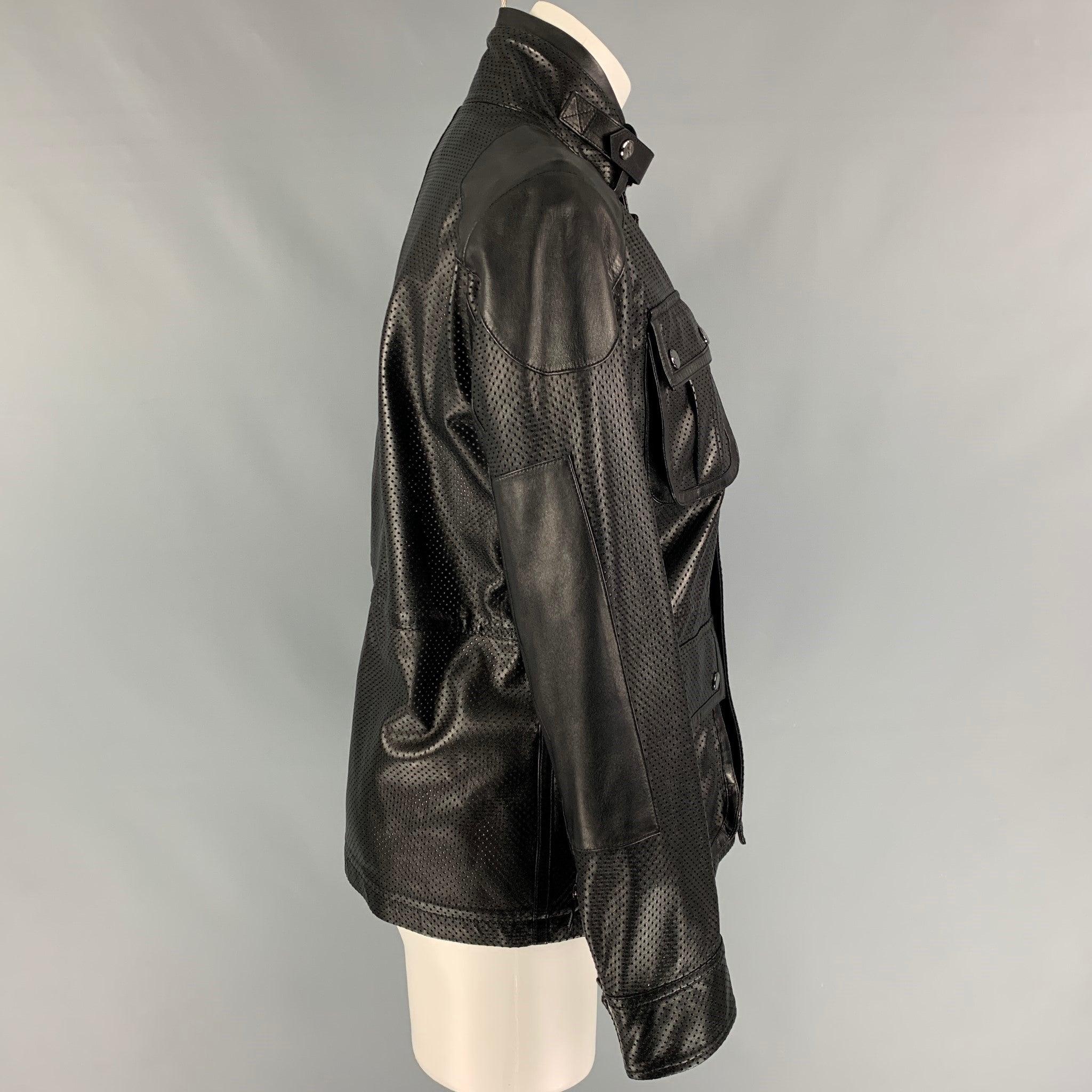RALPH LAUREN 'Black Label' jacket comes in a black perforated lamb skin leather featuring patch pockets, silver tone hardware, collar strap, and a zip & snap button closure. Made in Italy.
Very Good
Pre-Owned Condition. 

Marked:   2 

Measurements:
