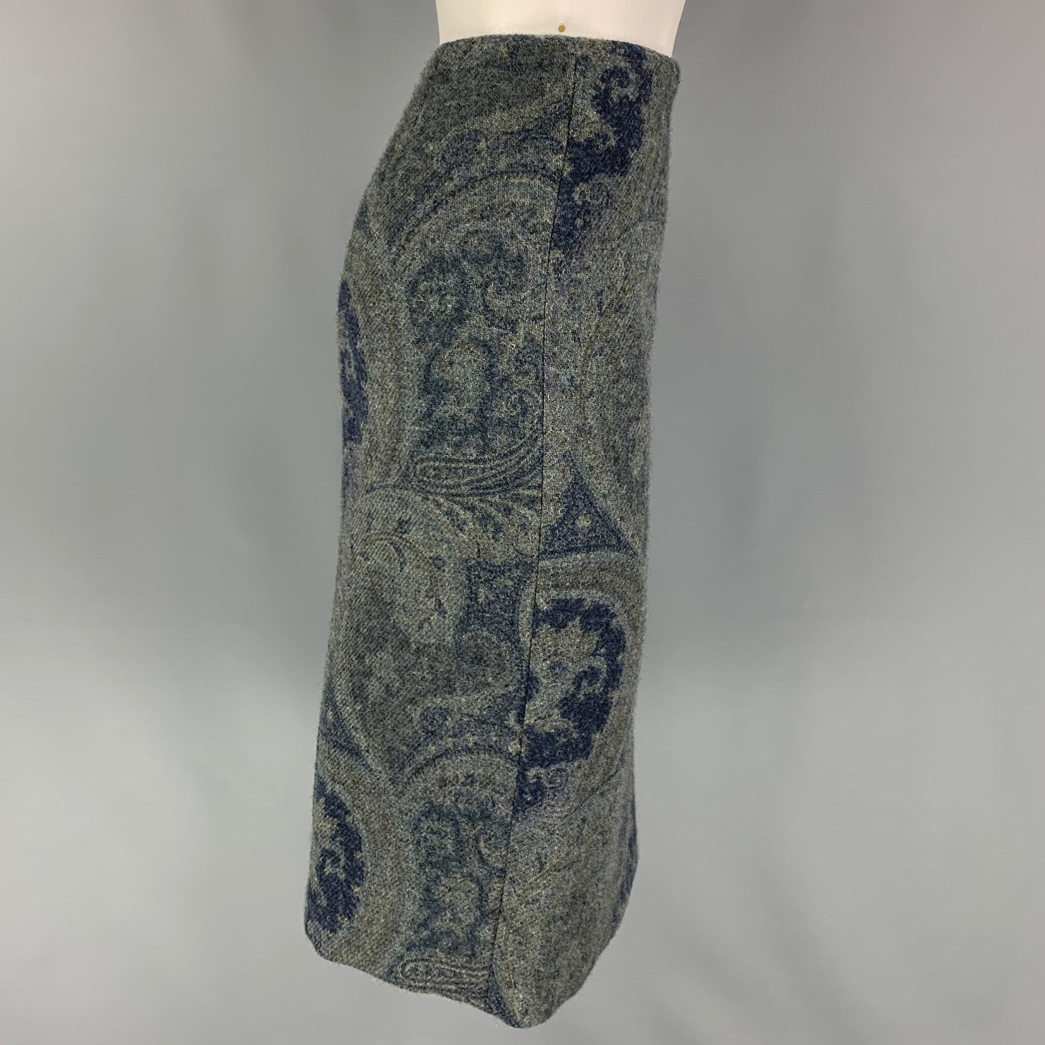 RALPH LAUREN 'Black Label' skirt comes in a grey & blue paisley wool with a slip liner featuring a pencil style, back slit, and aside zipper closure. Made in USA. Very Good
Pre-Owned Condition. 

Marked:   4 

Measurements: 
  Waist: 30 inches  Hip: