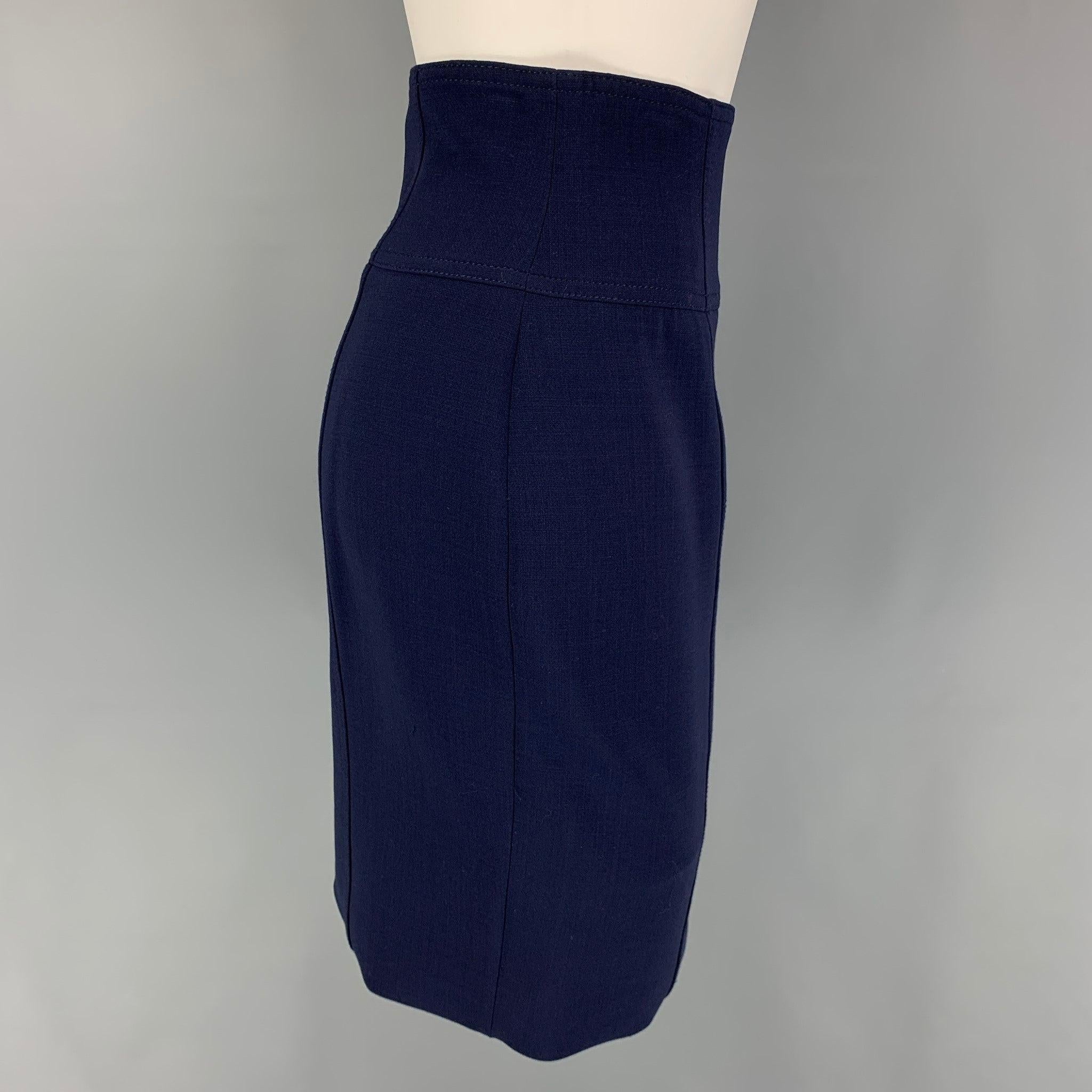 RALPH LAUREN 'Black Label' skirt comes in a navy wool featuring a pencil style and a side zipper closure. Very Good
Pre-Owned Condition. 

Marked:   4 

Measurements: 
  Waist: 26 inches  Hip: 34 inches  Length: 20.5 inches 
  
  
 
Reference:
