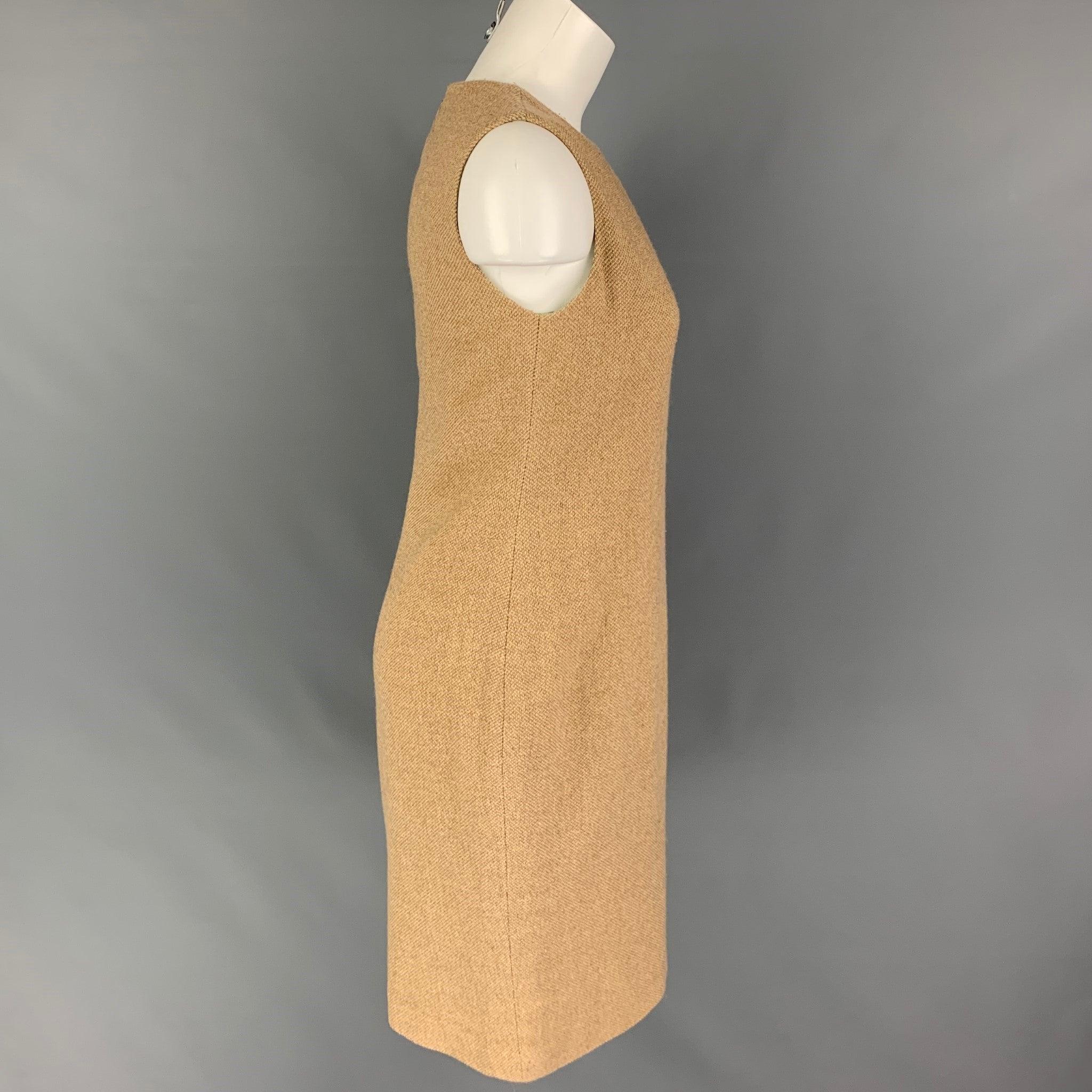 RALPH LAUREN 'Black Label' dress comes in a beige wool blend featuring an a-line style, sleeveless, and a back zipper closure. Made in USA.
Very Good
Pre-Owned Condition. 

Marked:  6 

Measurements: 
 
Shoulder: 13 inches Bust: 32 inches Waist: 32