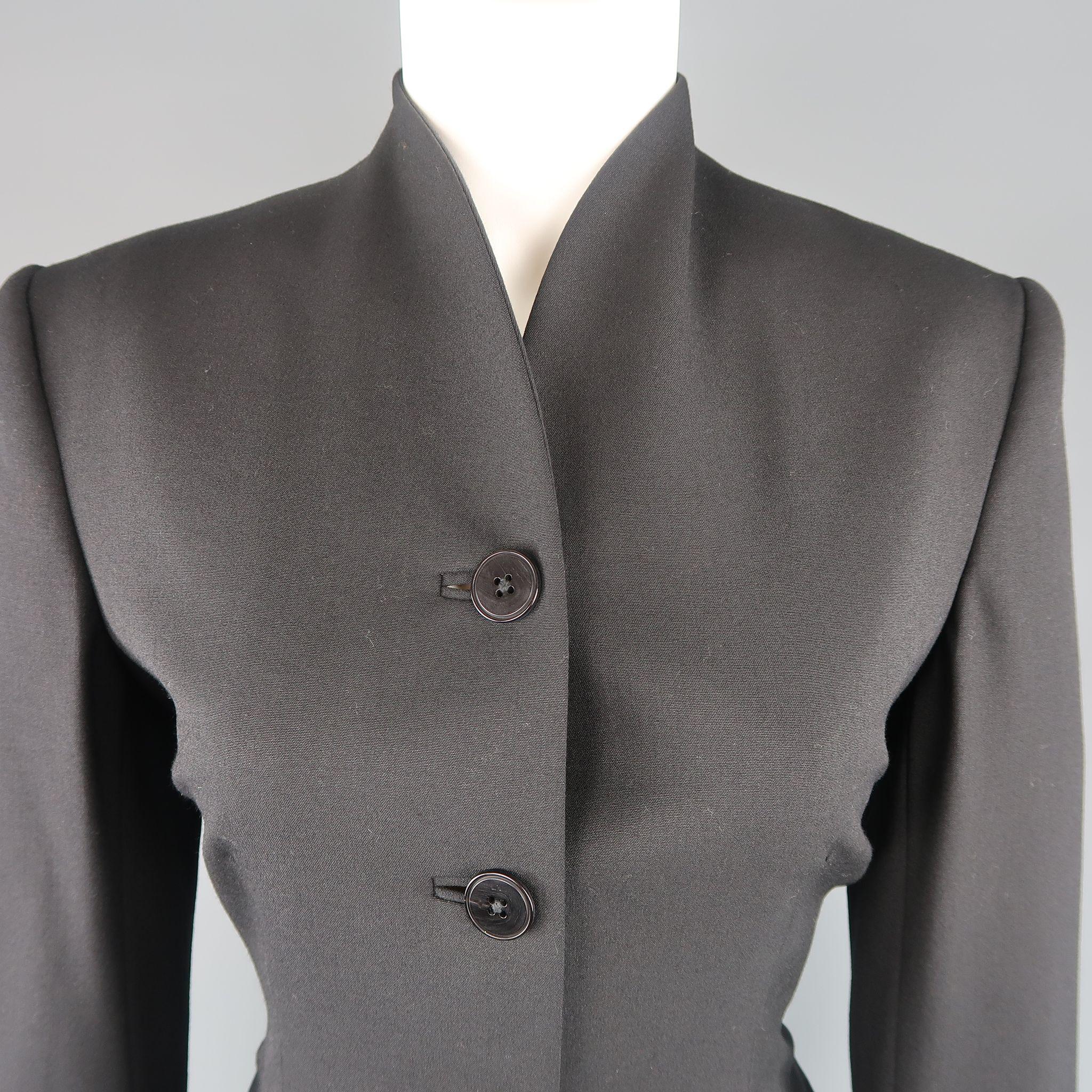 RALPH LAUREN BLACK LABEL jacket comes in black wool with a four button front, cropped,tailored silhouette, and stand up collar. Small imperfection on back. Made in USA.
 
Good Pre-Owned Condition.
Marked: 6
 
Measurements:
 
Shoulder: 16 in.
Bust: 