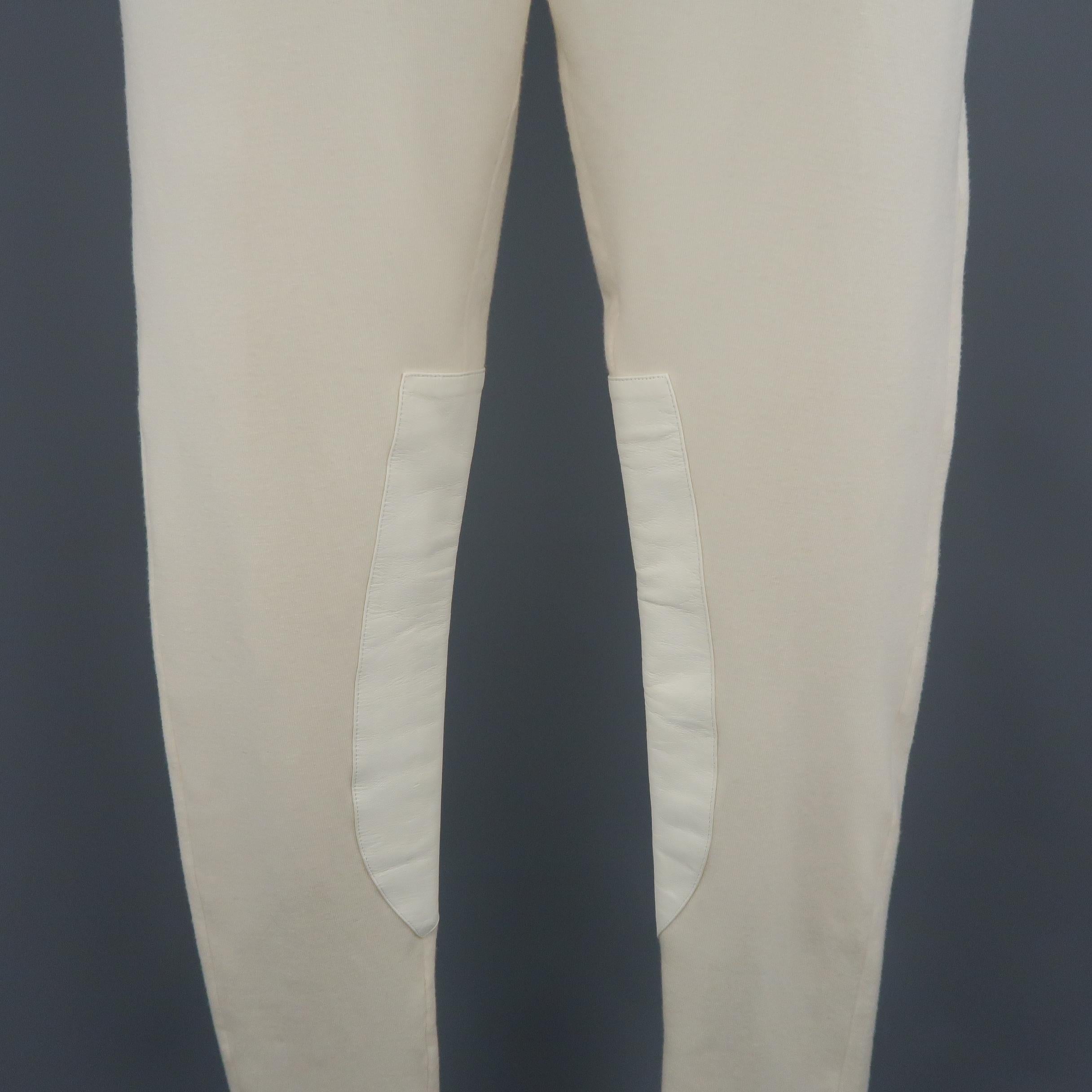 BLACK LABEL by RALPH LAUREN leggings come in creamy beige wool knit with white leather riding style inserts.
 
Excellent Pre-Owned Condition.
Marked: M
 
Measurements:
 
Waist: 30 in.
Rise: 9 in.
Inseam:  27 in.