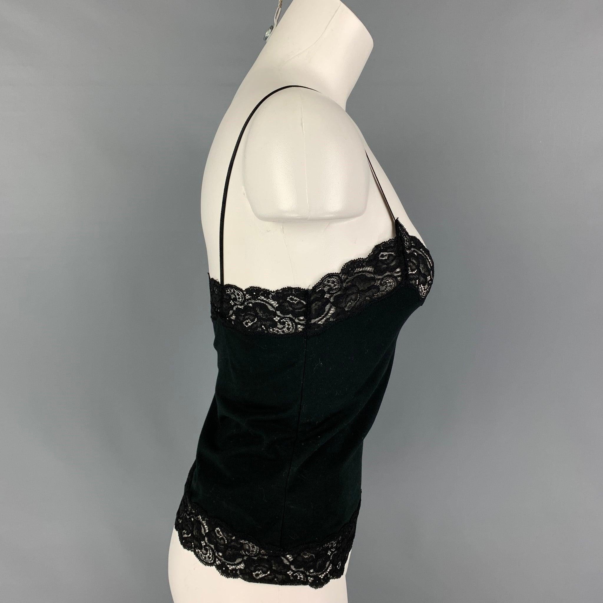 RALPH LAUREN 'Black Label' camisole comes in a mercerized cotton featuring a lace panel and a spaghetti straps.
Good
Pre-Owned Condition. Light marks. As-Is.  

Marked:   M/M 

Measurements: 
  Bust: 28 inches  Length: 12.5 inches 
  
  
