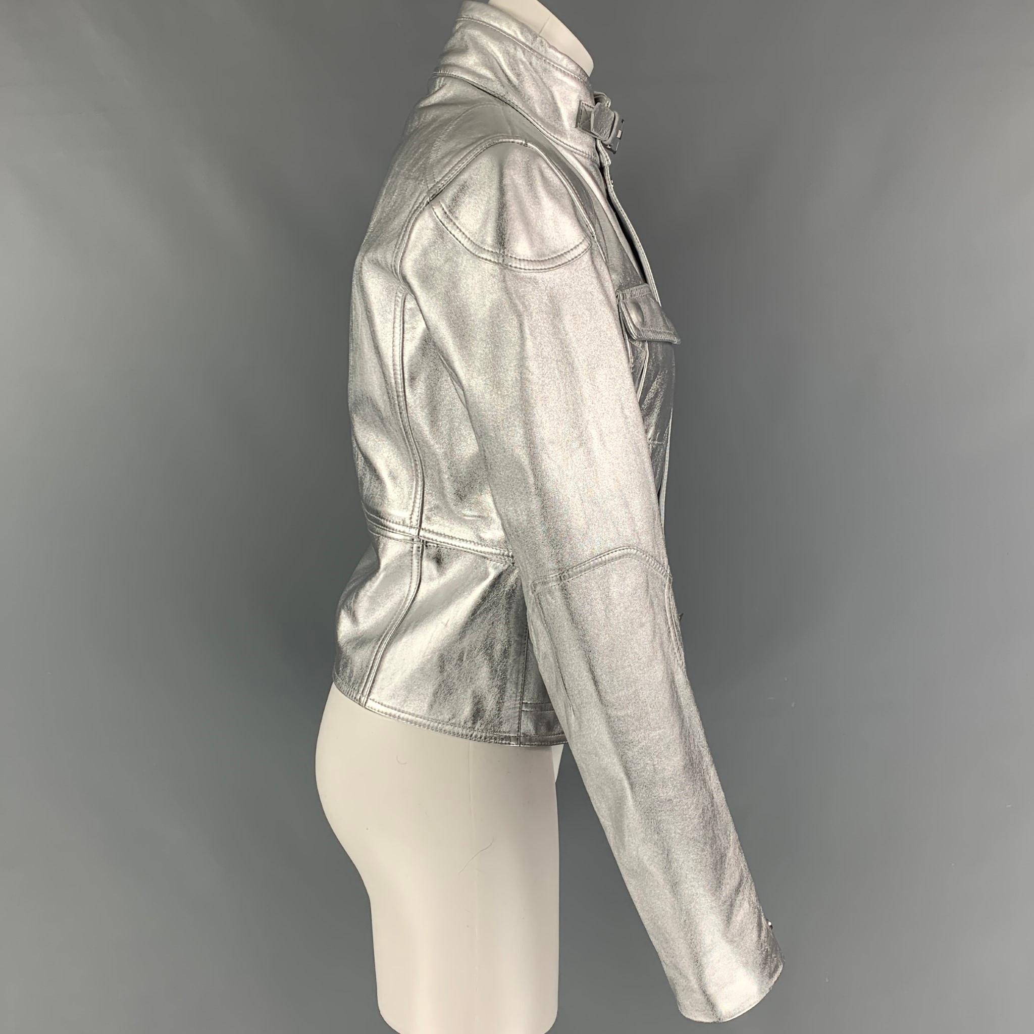 RALPH LAUREN 'Black Label' jacket comes in a silver metallic leather featuring a detachable panel, front pockets, collar strap, strap details, and a hidden zip & snap button closure. Made in Italy. 

Excellent Pre-Owned Condition.
Marked: