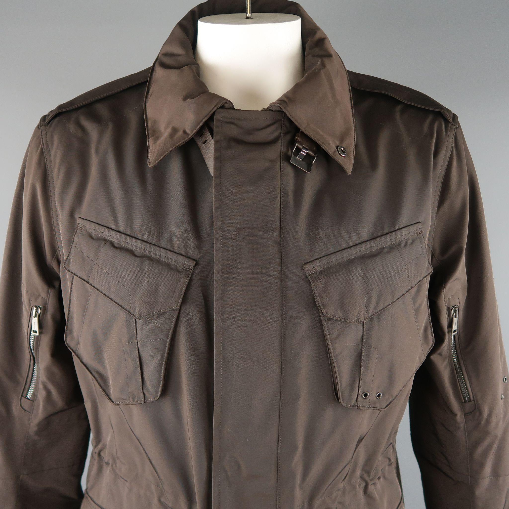 RALPH LAUREN BLACK LABEL  jacket comes in a brown solid polyester material, with patch pockets, zip and snaps and belted cuffs. Made in Italy.
 
Excellent Pre-Owned Condition.
Marked: XL
 
Measurements:
 
Shoulder:  19  in.
Chest: 47  in.
Sleeve: