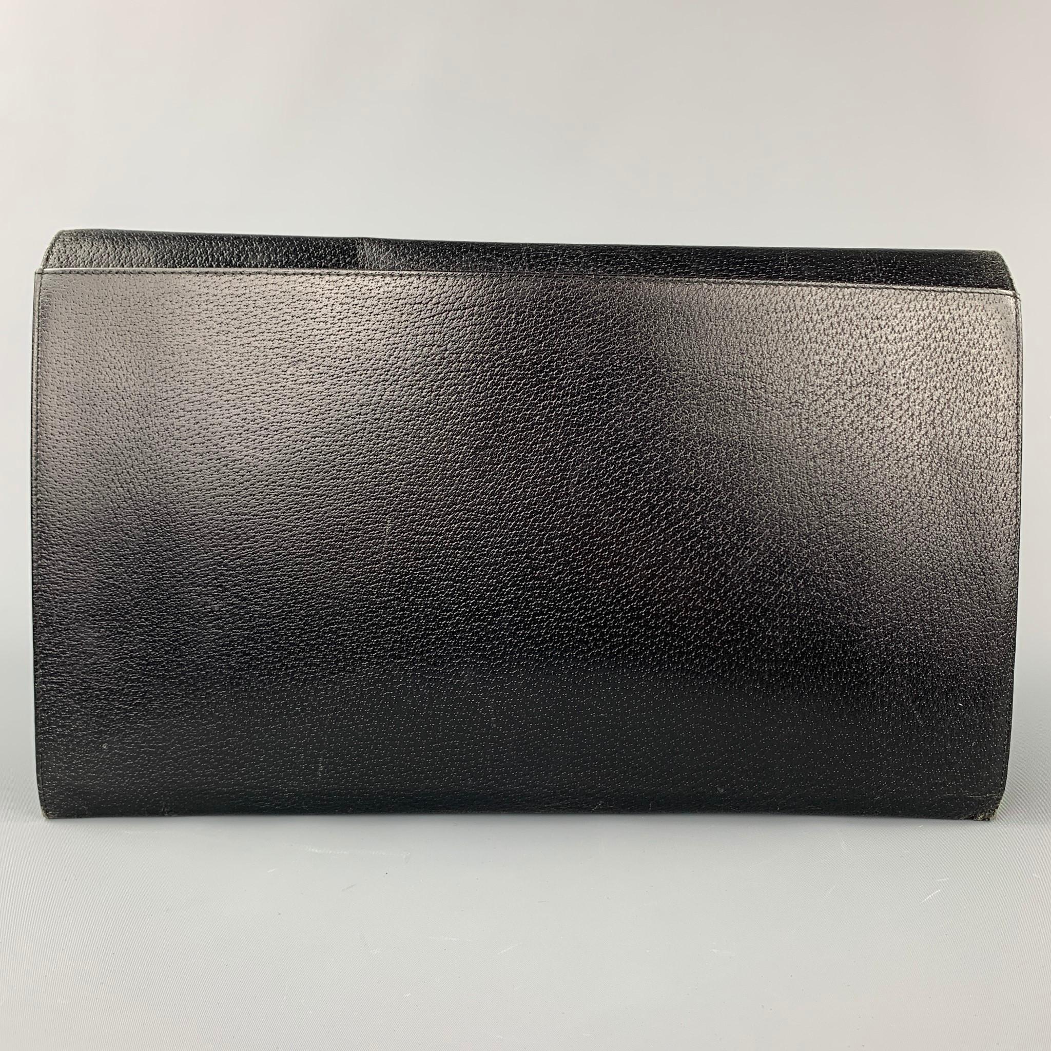 RALPH LAUREN briefcase comes in a black pigskin leather featuring inner dividers, zipper pocket, and a front lock closure. Made in Italy. 

Very Good Pre-Owned Condition.

Measurements:

Length: 15.5 in.
Height: 10 in.