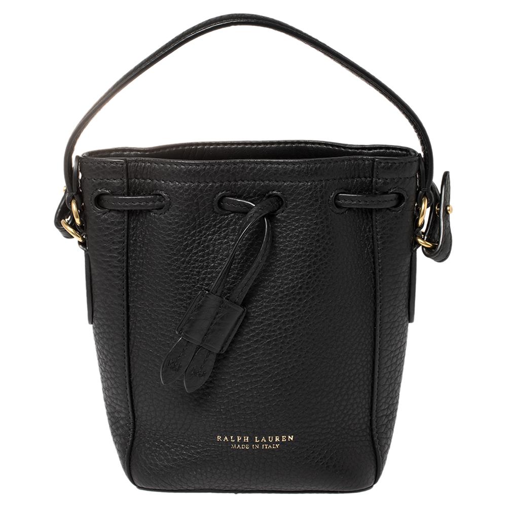 This Ralph Lauren Ricky bag is simply breathtaking. Meticulously crafted from leather, the bag delights not only with its appeal but its structure as well. It is held by two top handles, detailed with gold-tone hardware, and equipped with a spacious