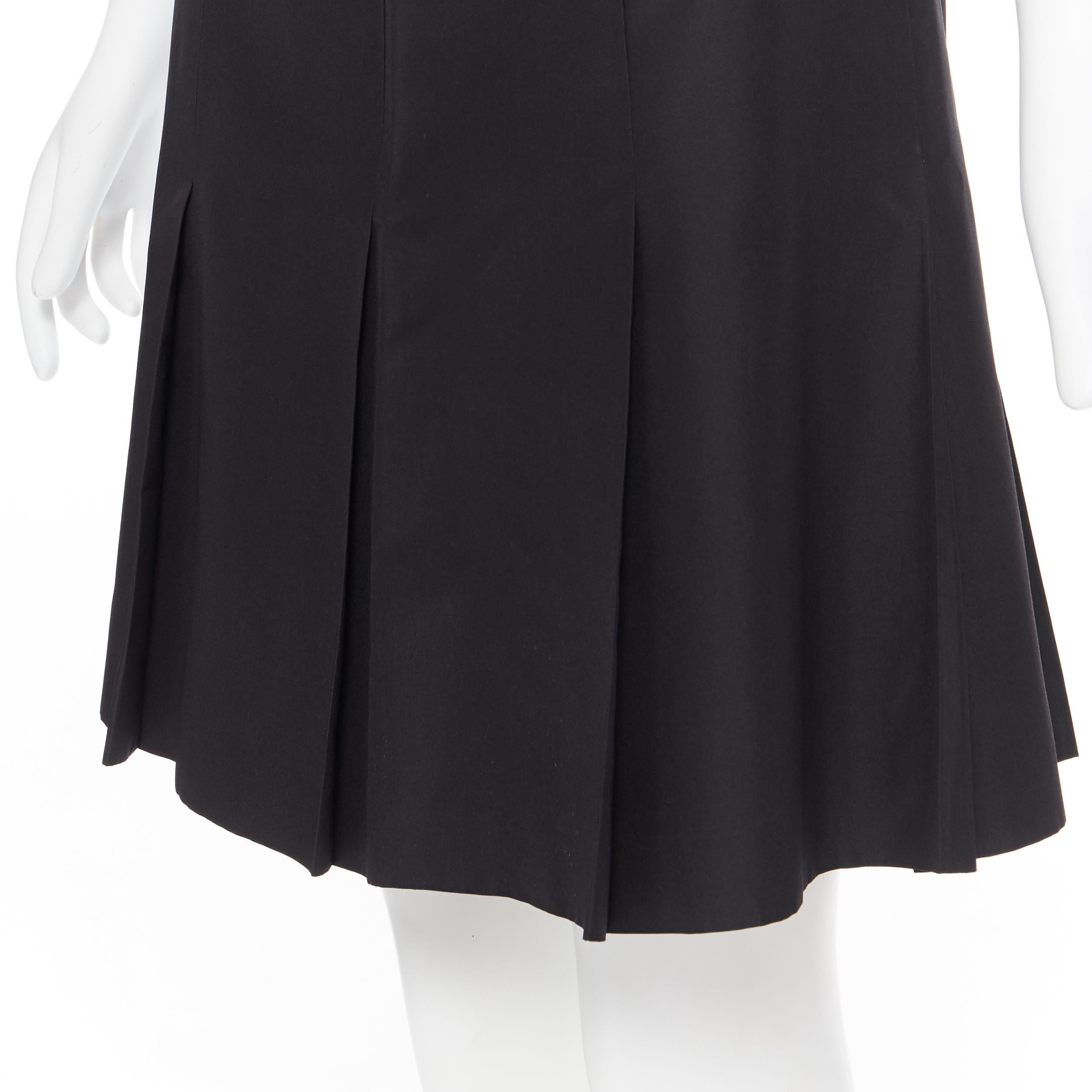 RALPH LAUREN black pleated hem A-line knee length skirt work US2 XS 
Reference: LNKO/A01722 
Brand: Ralph Lauren 
Material: Unknown 
Color: Black 
Pattern: Solid 
Closure: Zip 
Extra Detail: Zip closure on side of waist. Pleating at hem. Fully