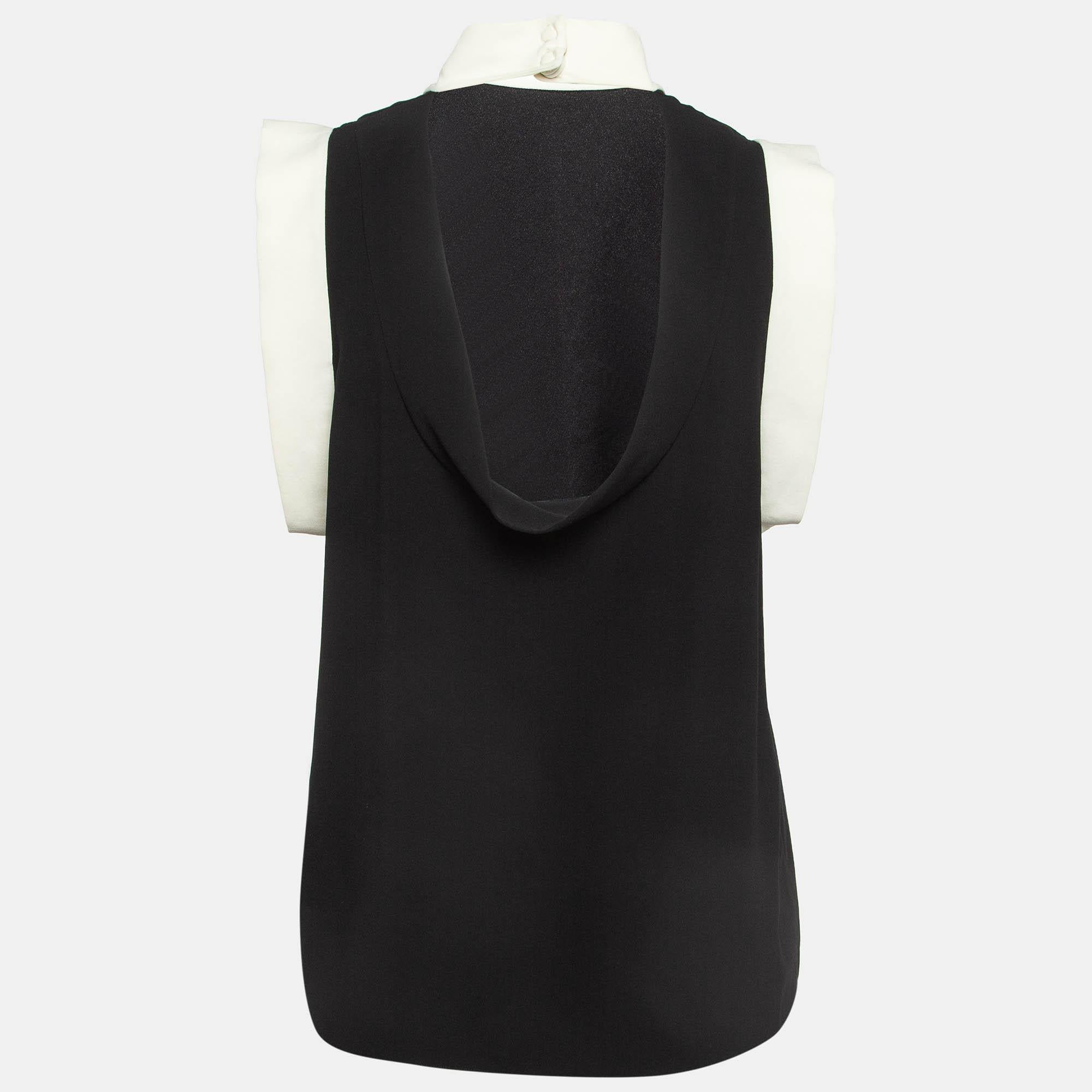 Un'accurata sartoria  materiali di qualità  Il design classico e i tagli eleganti rendono questo top di design un pezzo da conservare.