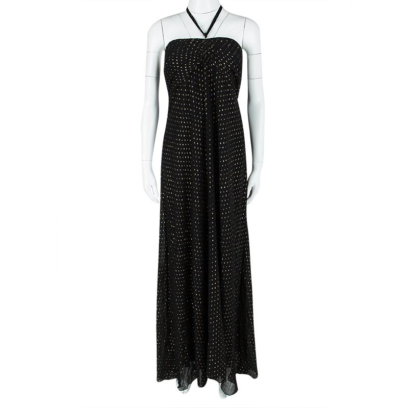 Dress to impress with this stunning strapless dress from Ralph Lauren. The black dress has a strapless style with ruched details and clip dots all over. Complete this look with dangling earrings and black sandals.

Includes: The Luxury Closet