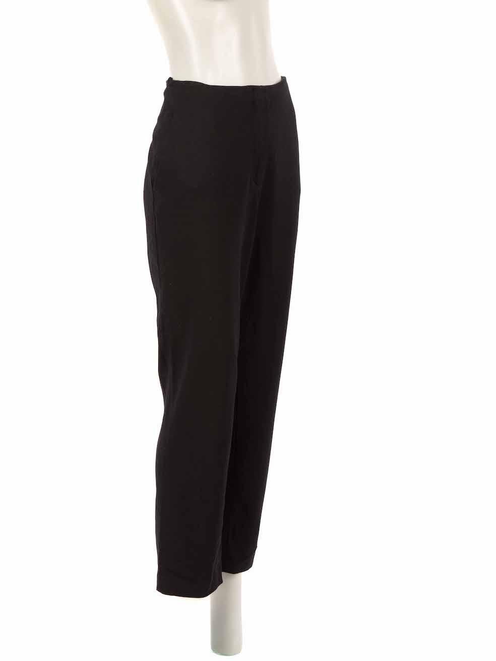 CONDITION is Very good. Hardly any visible wear to trousers is evident on this used Ralph Lauren designer resale item.
 
Details
Black
Wool
Trousers
Slim fit
Cropped
Mid rise
2x Side pockets
Fly zip, hook and button fastening
 
Made in Portugal
